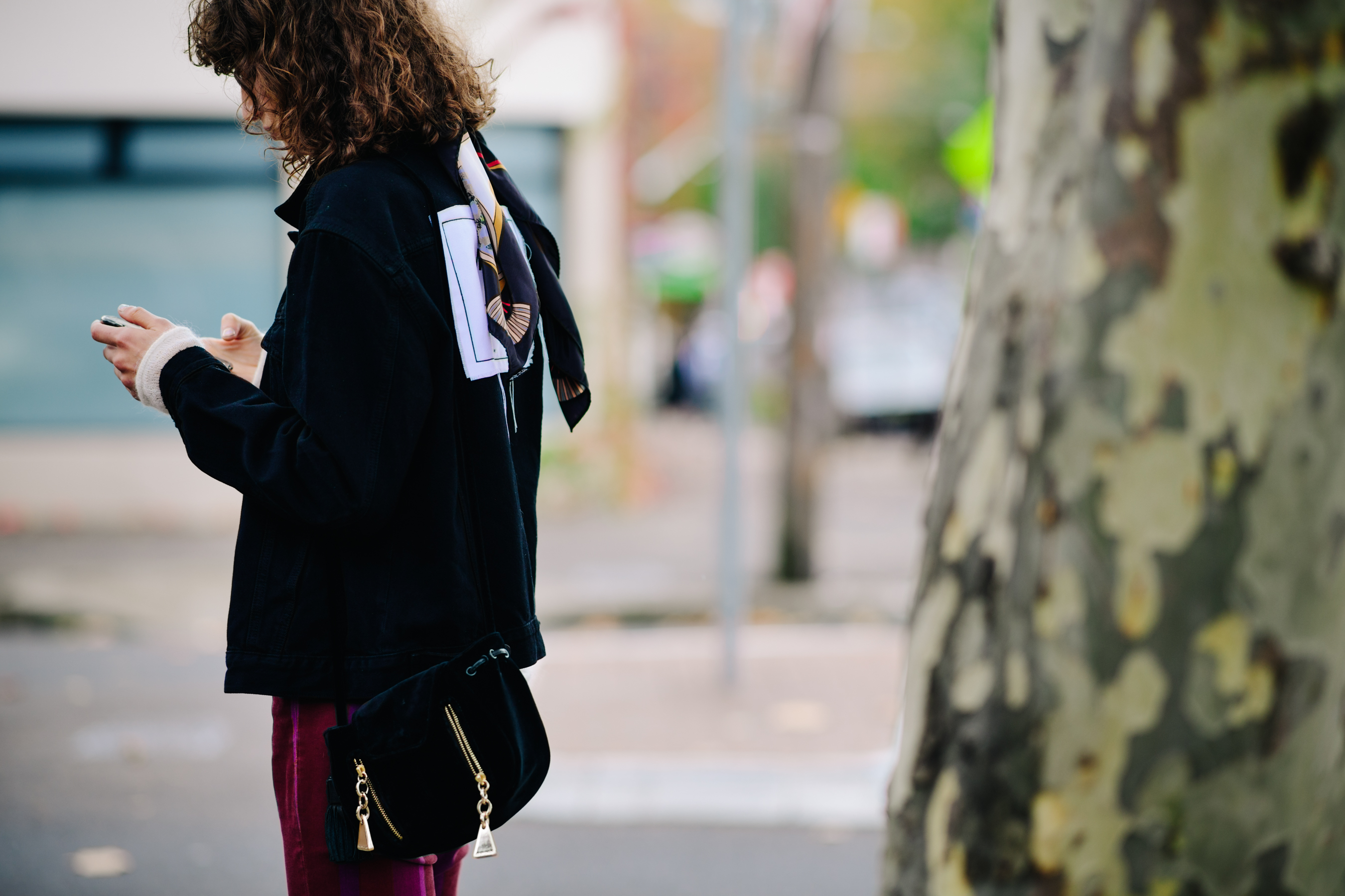 Woman wearing a black velvet jacket