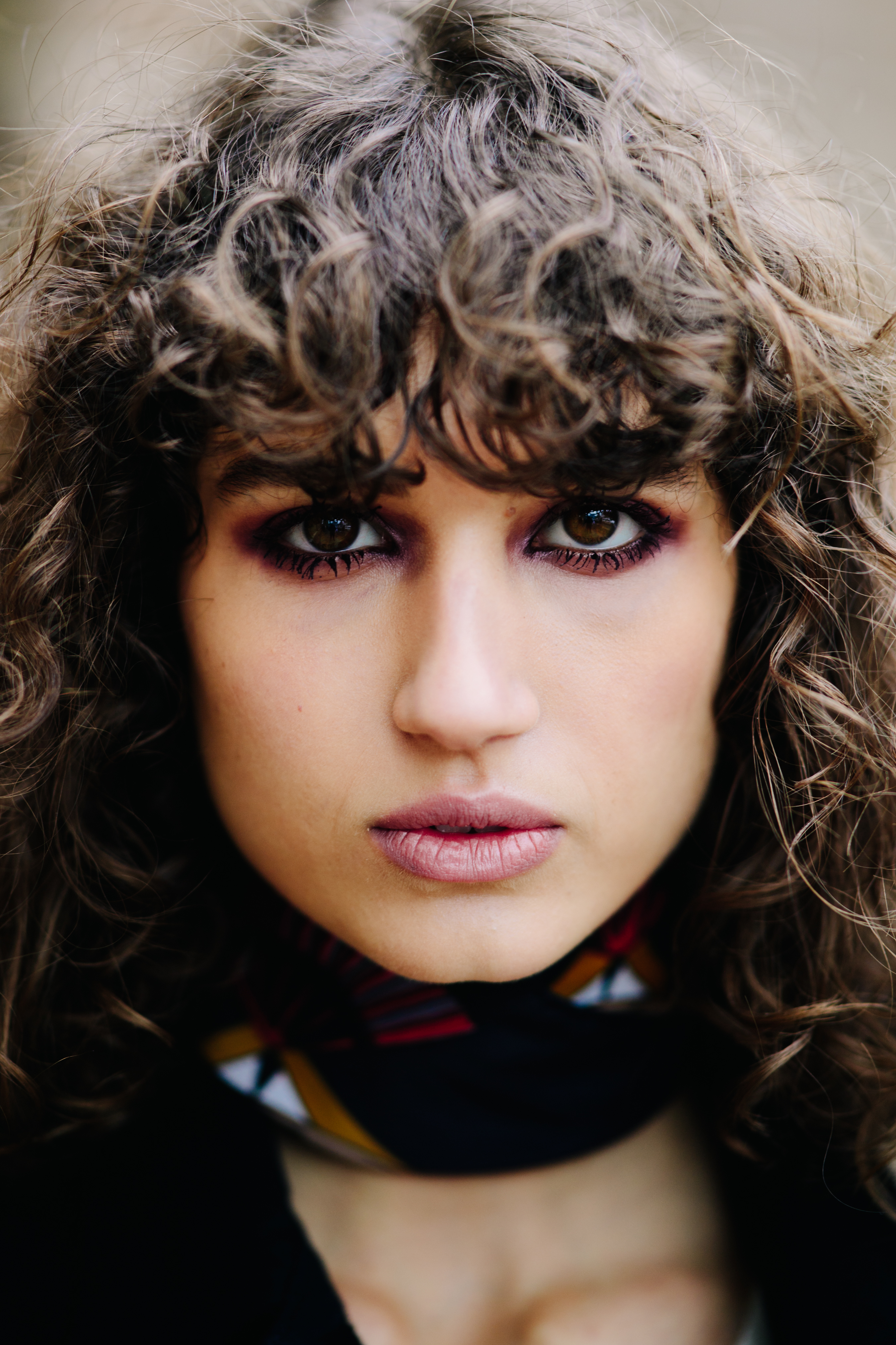 Portrait of a girl with curly hair