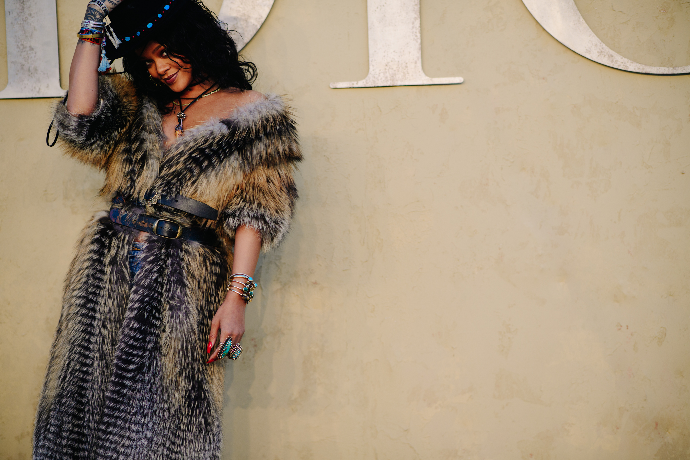 Girl wearing an oversized fur coat
