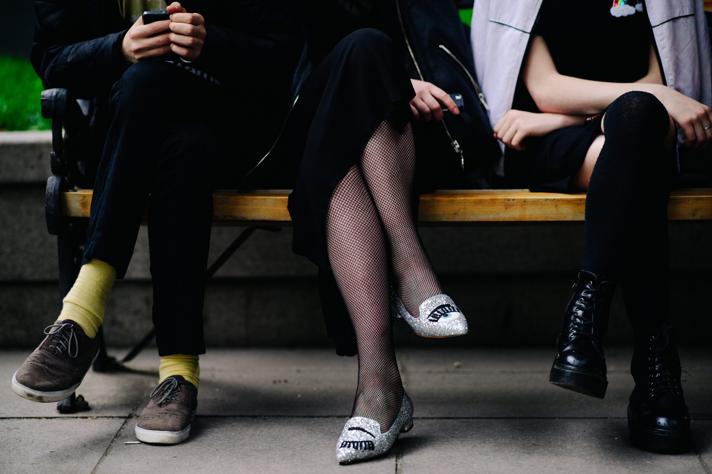 Woman wearing silver embroidered shoes