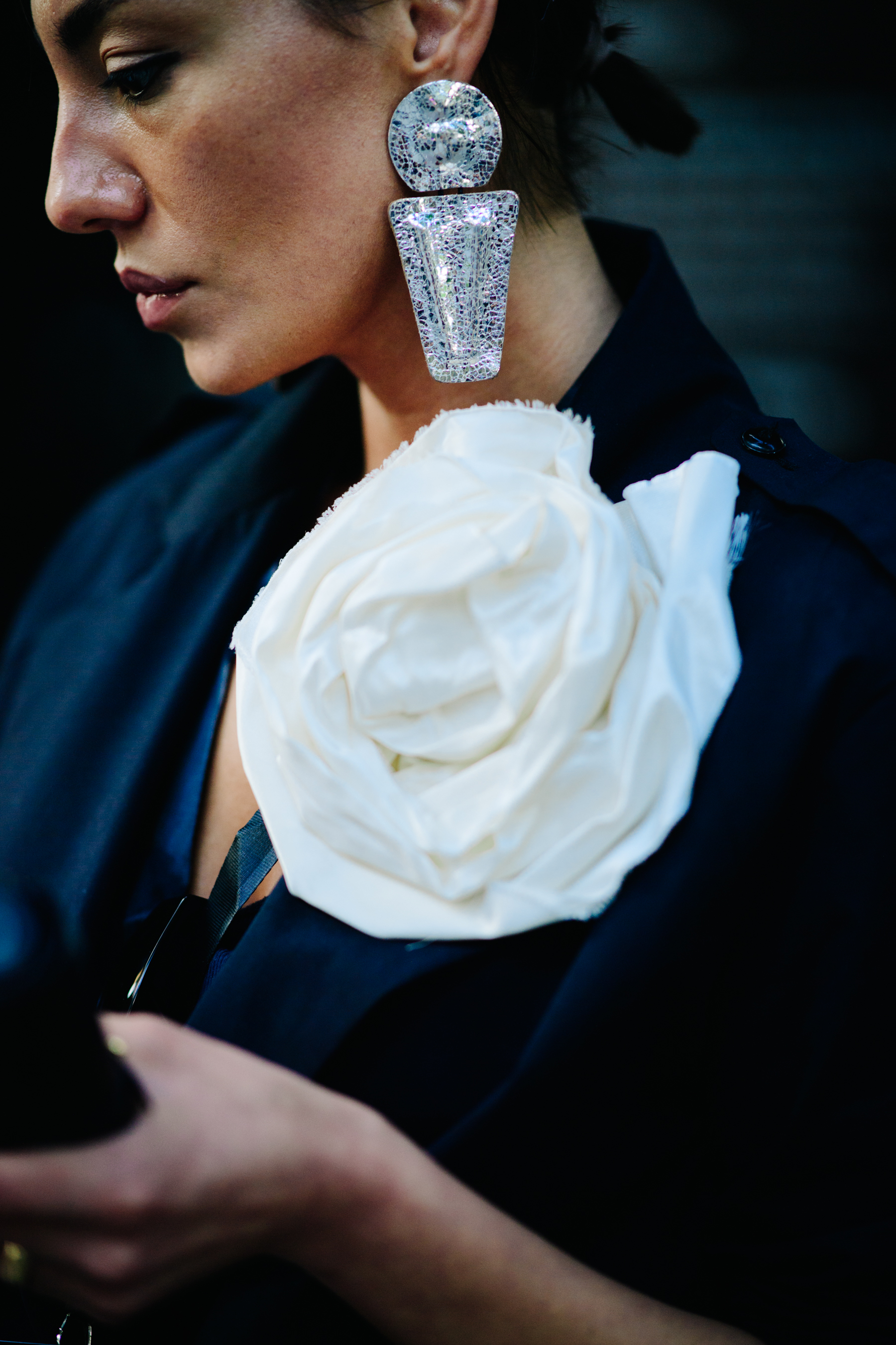 Woman wearing silver earring