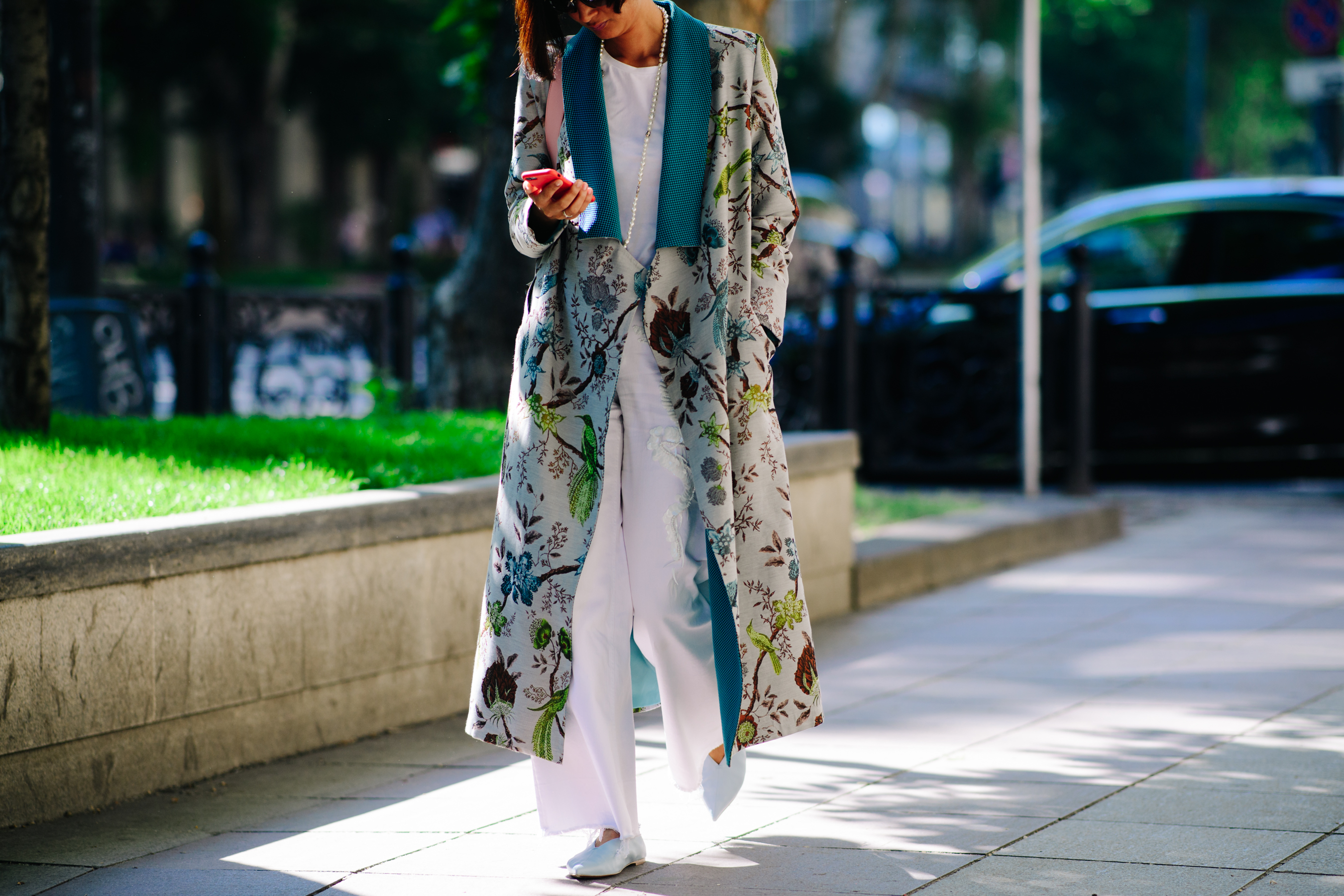 Woman wearing an embroidered coat