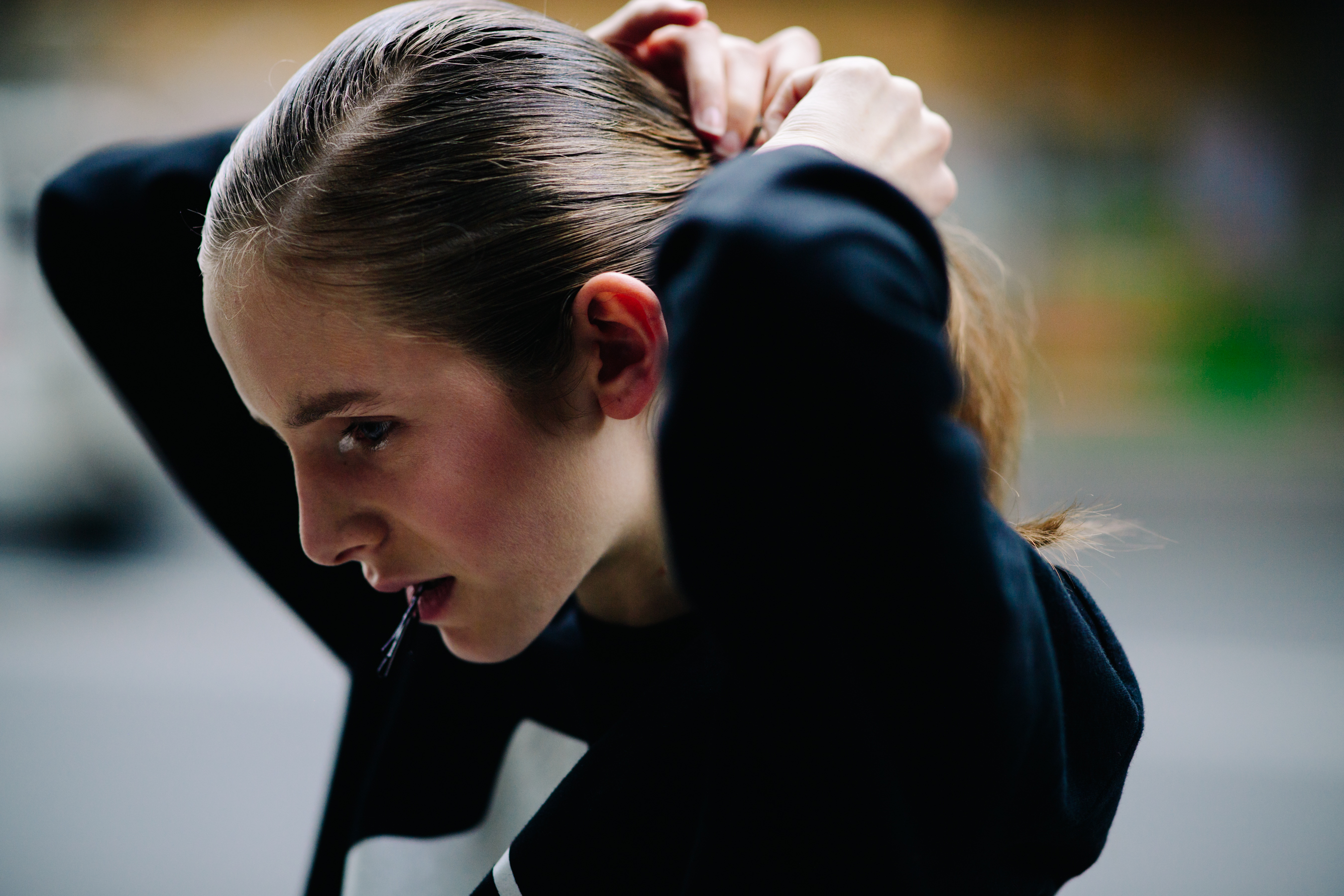 Young girl wearing a black sweater