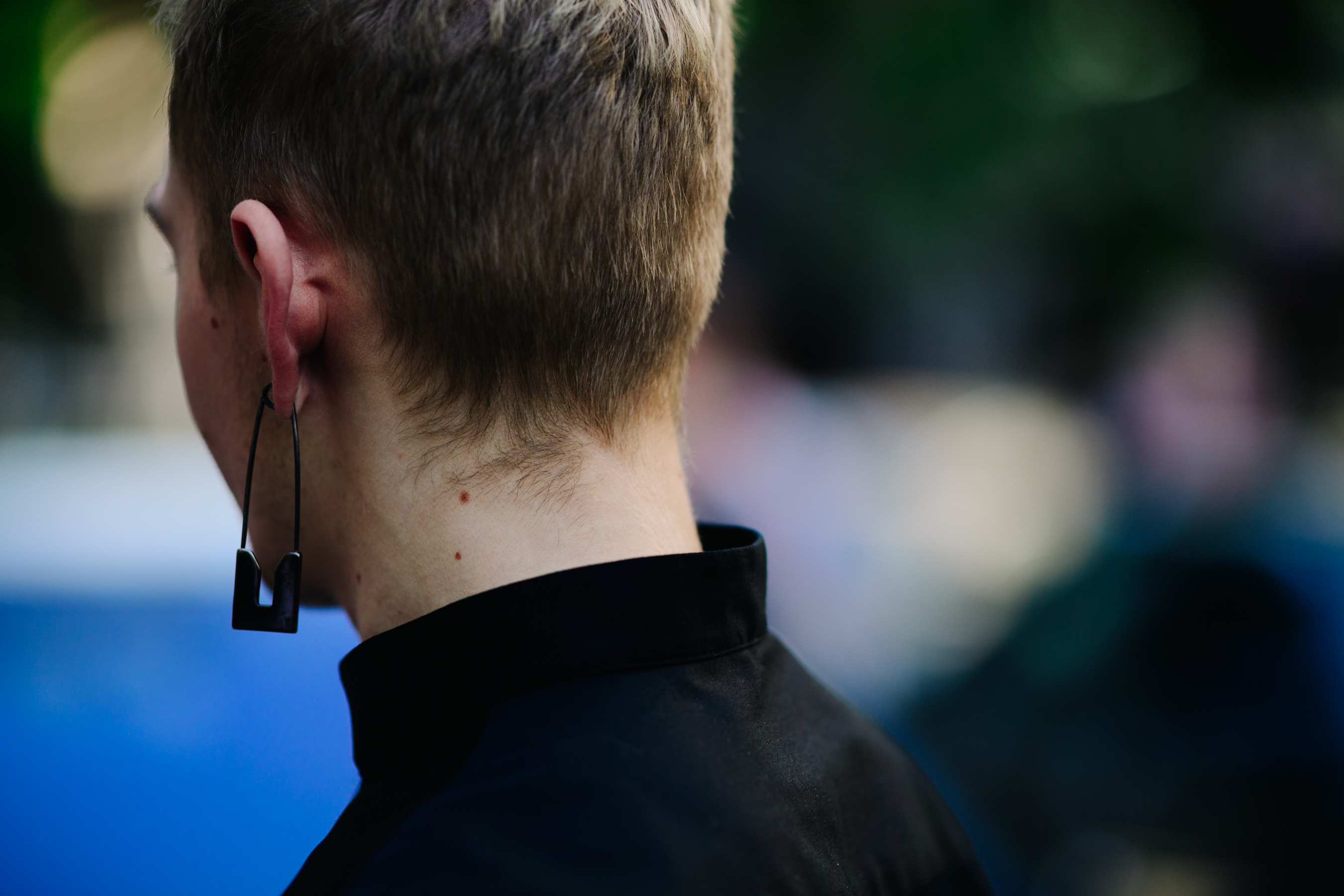 Russian stylist wearing an earring