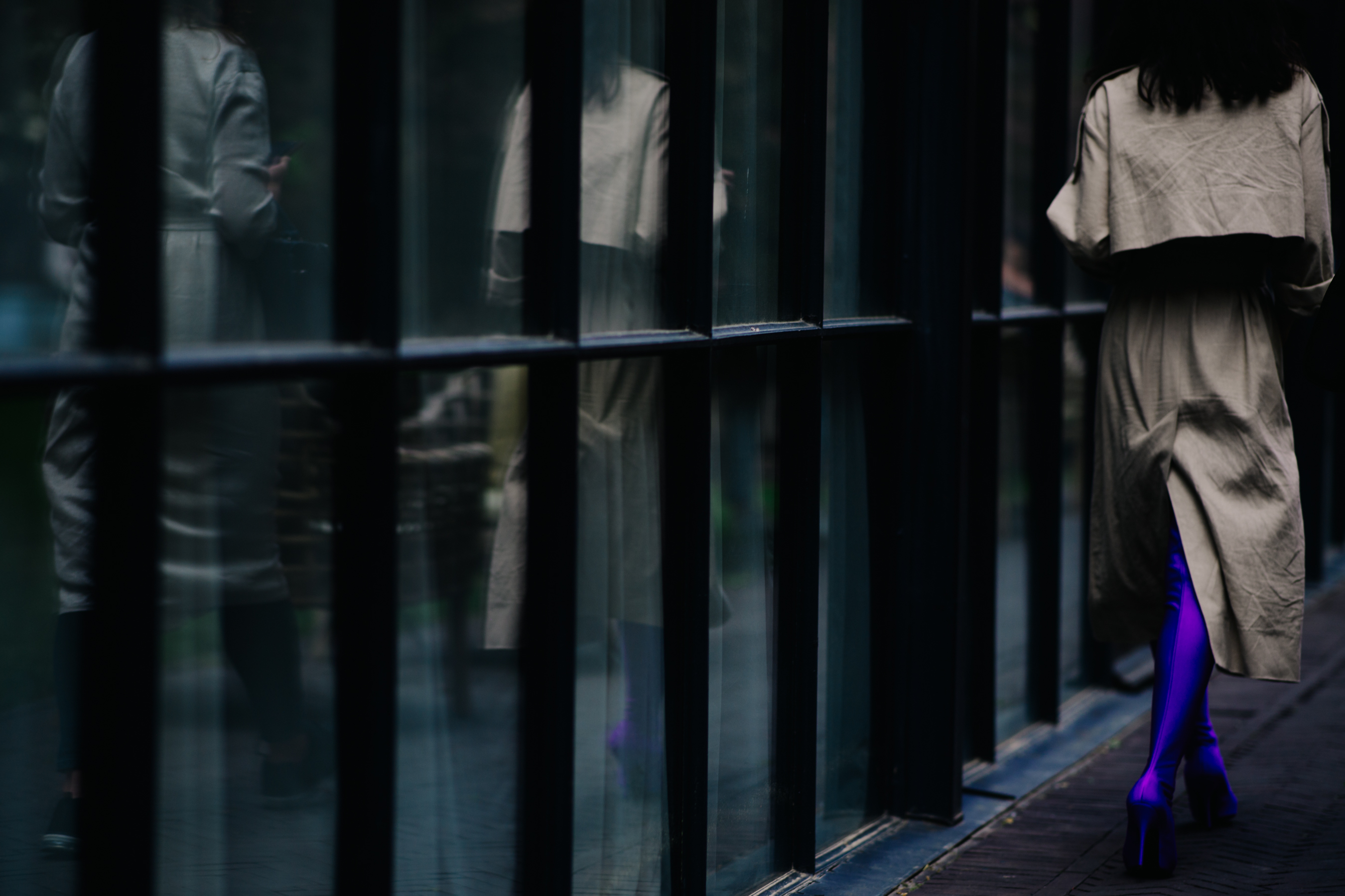 Woman walking up the street
