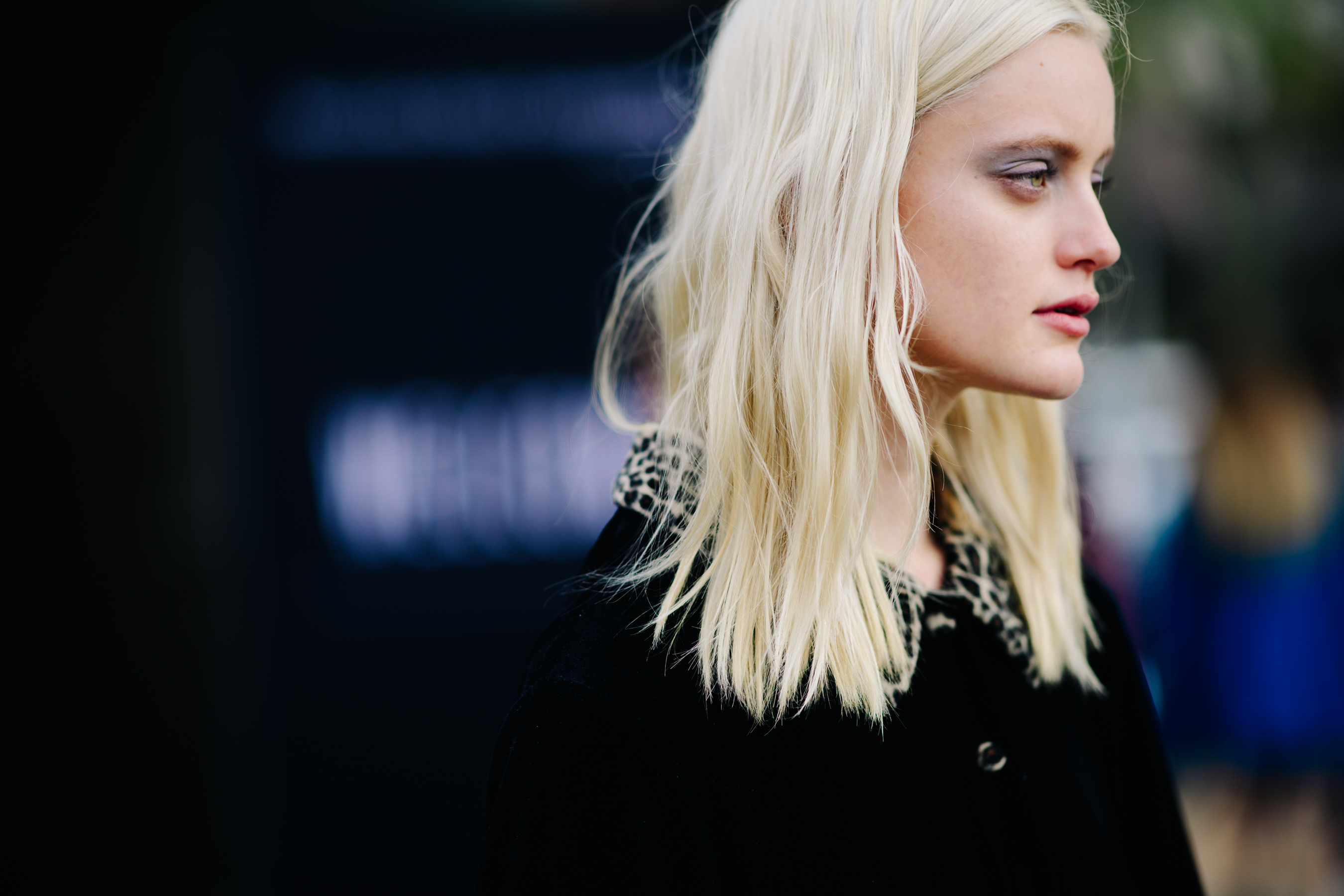 Girl wearing a black coat