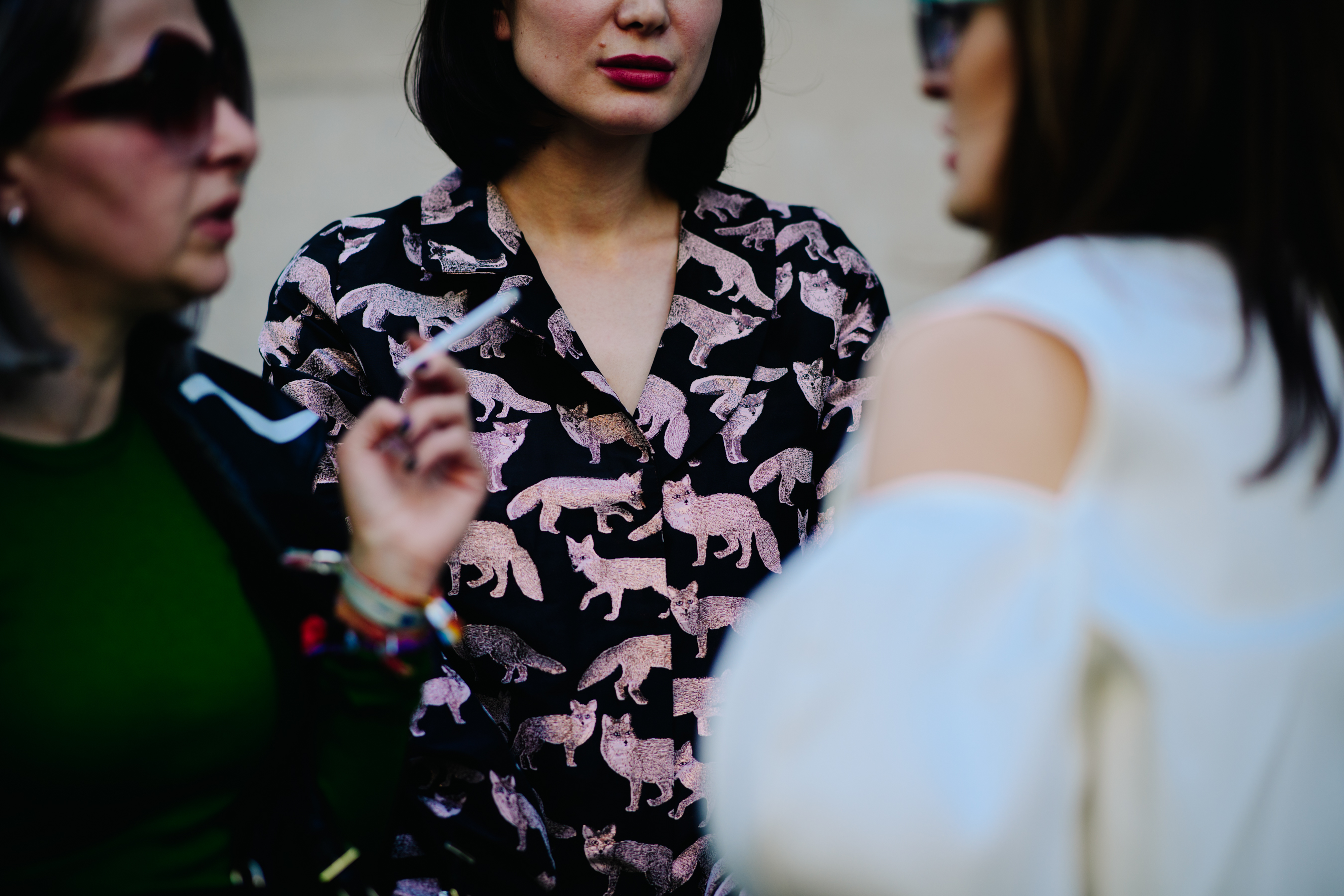Woman wearing pattern blouse