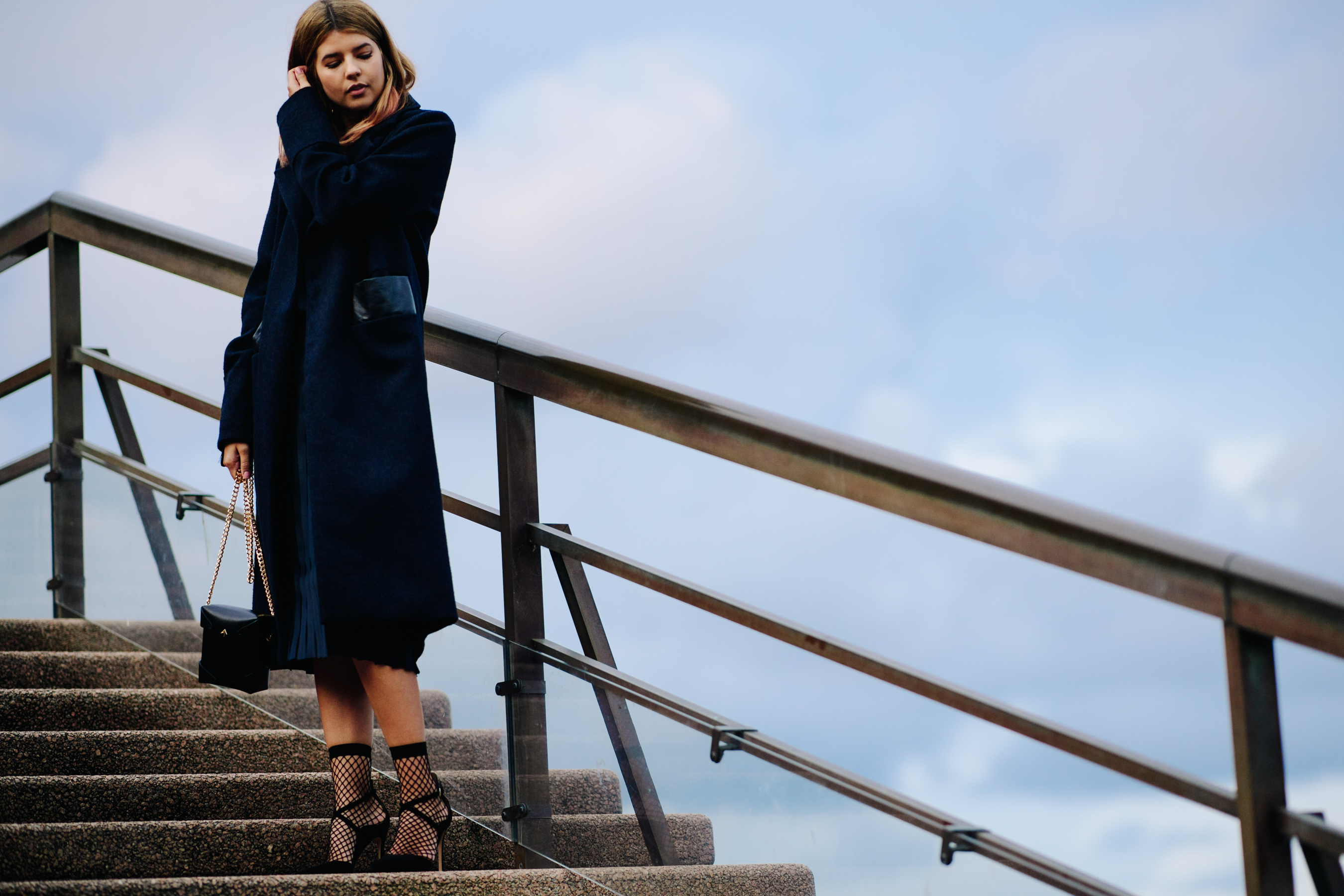 Woman wearing black coat