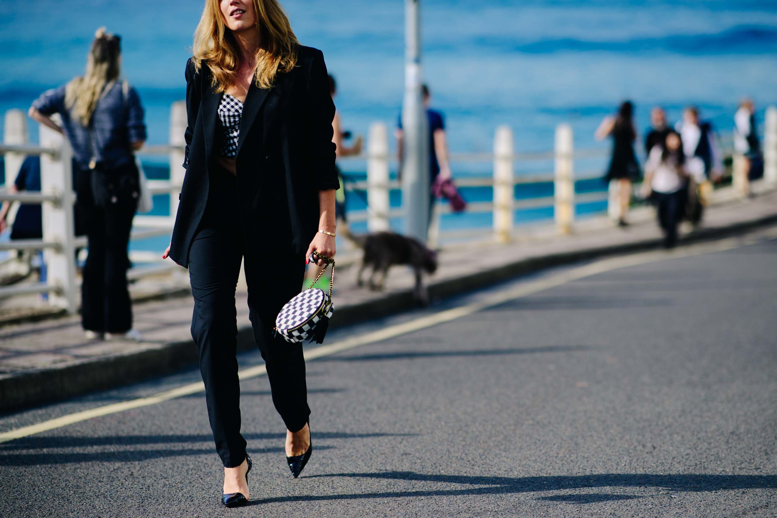Woman wearing a classic black suit