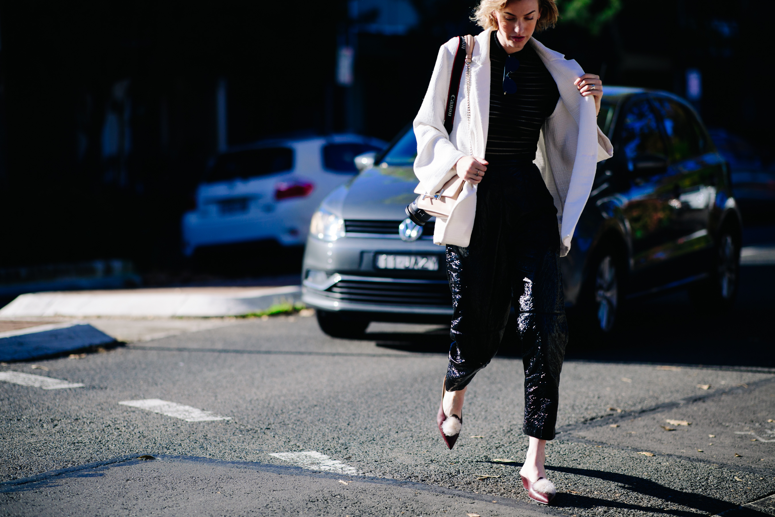 Girl wearing a white jacket