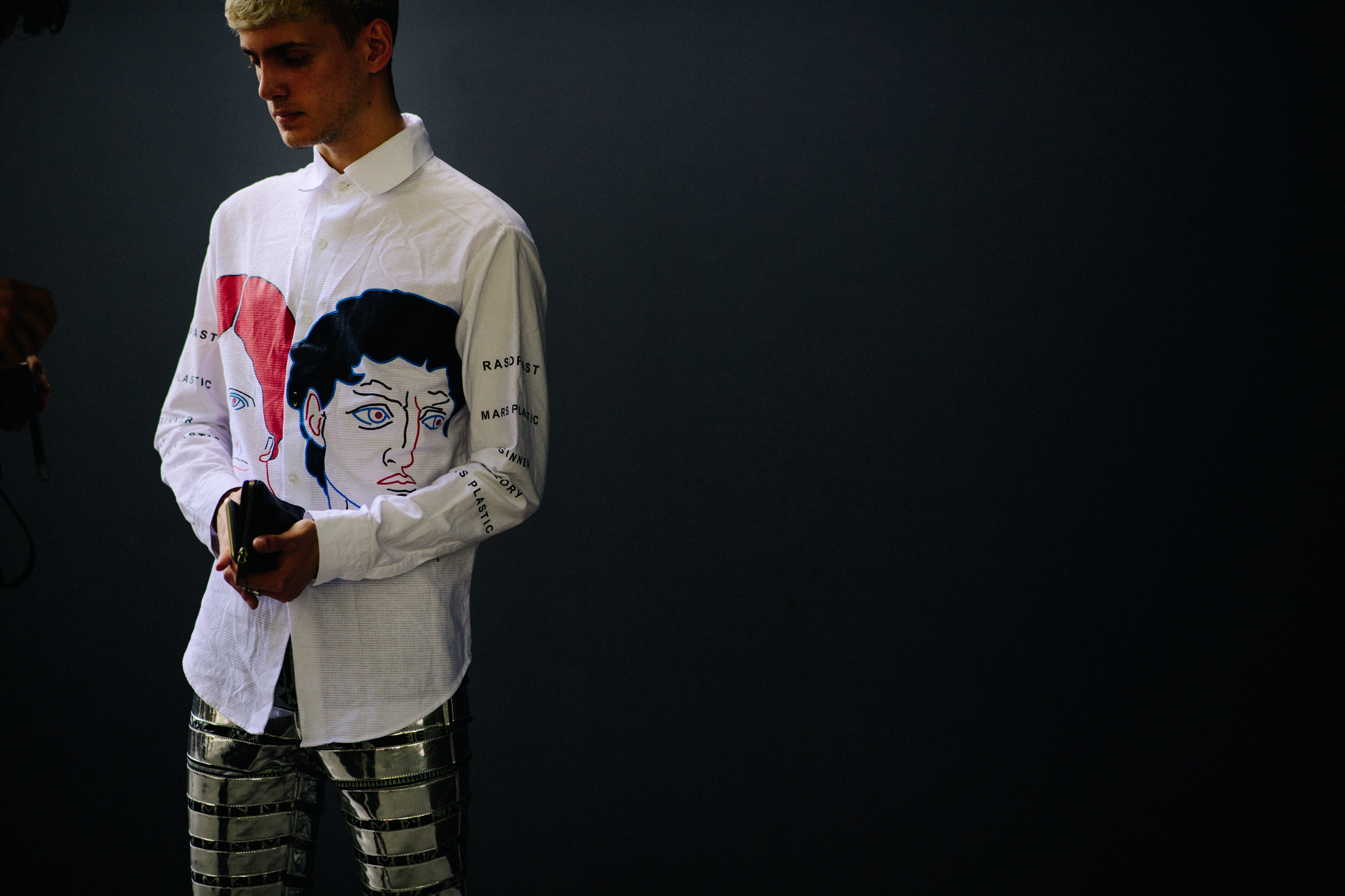 Boy wearing an embroidered white shirt
