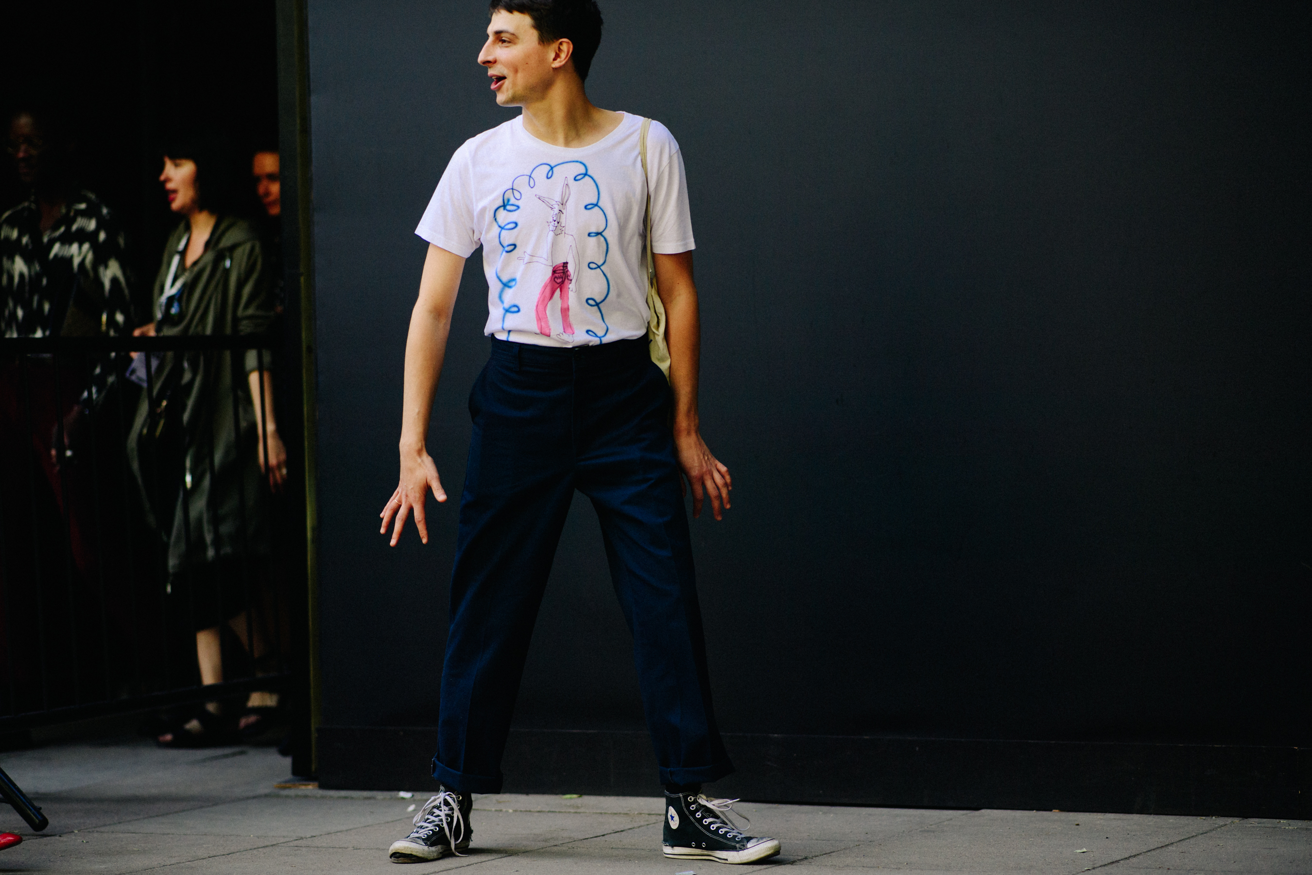 Boy wearing old Converse sneakers