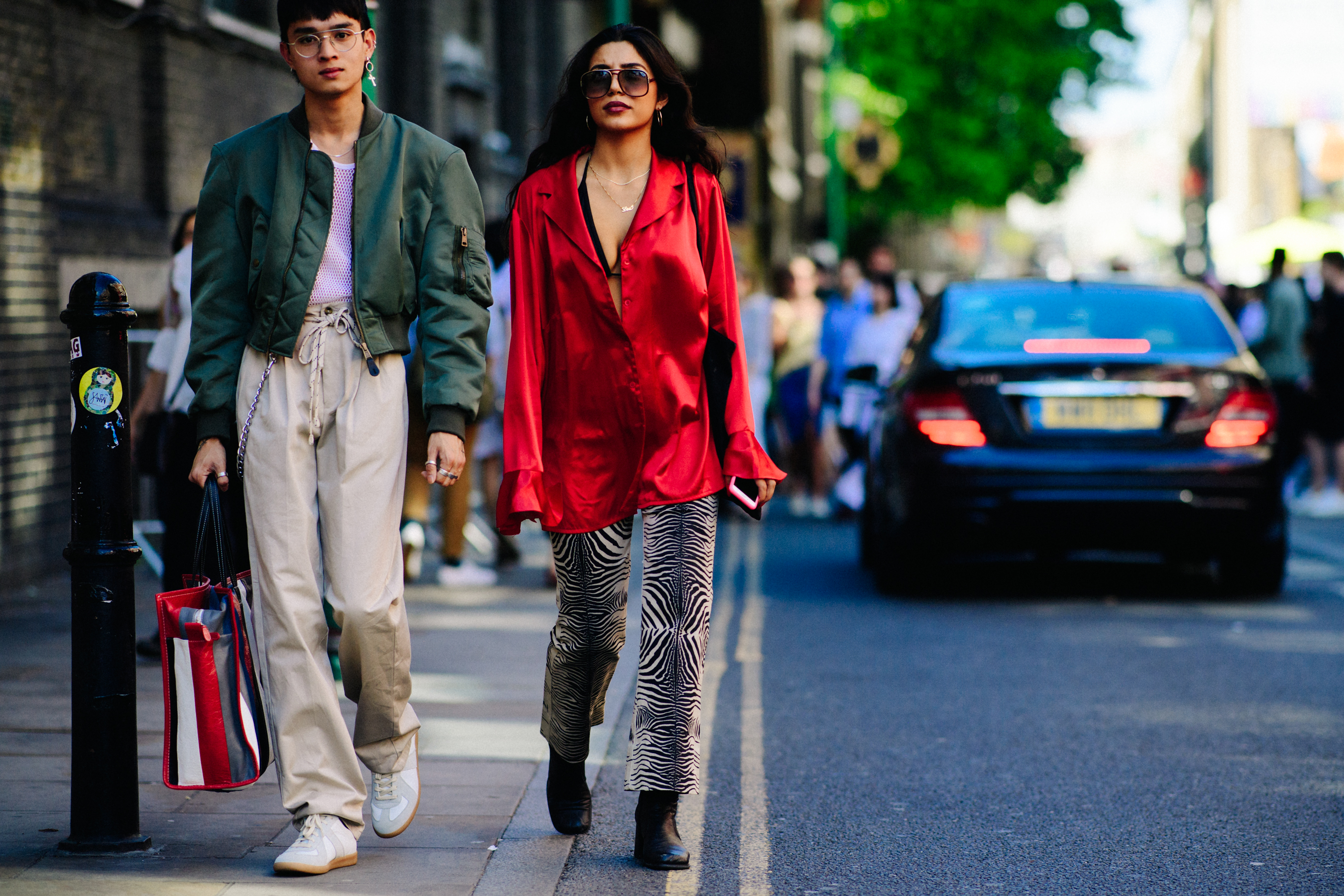 Girl wearing red silk shirt