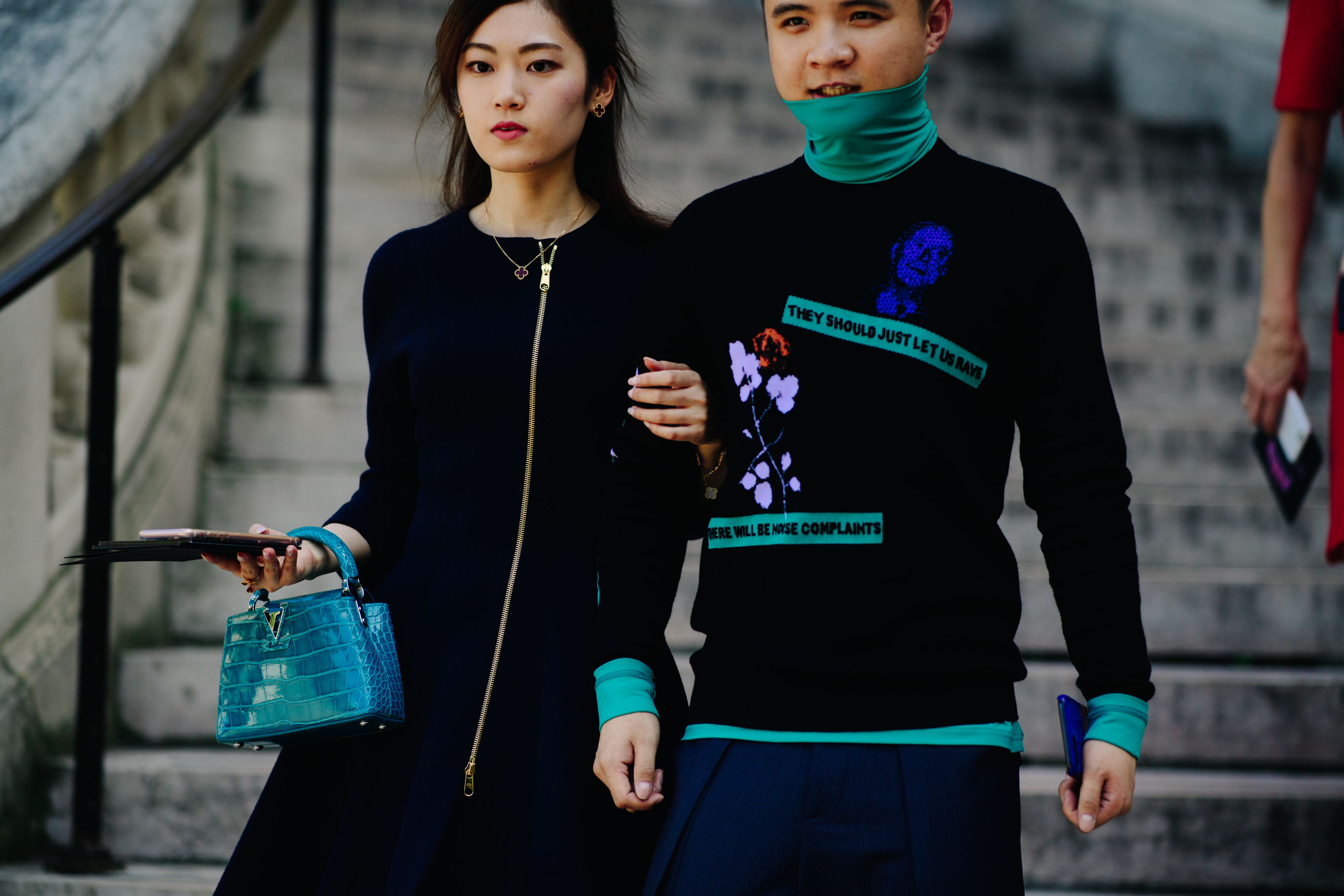 Girl and boy wearing Louis Vuitton