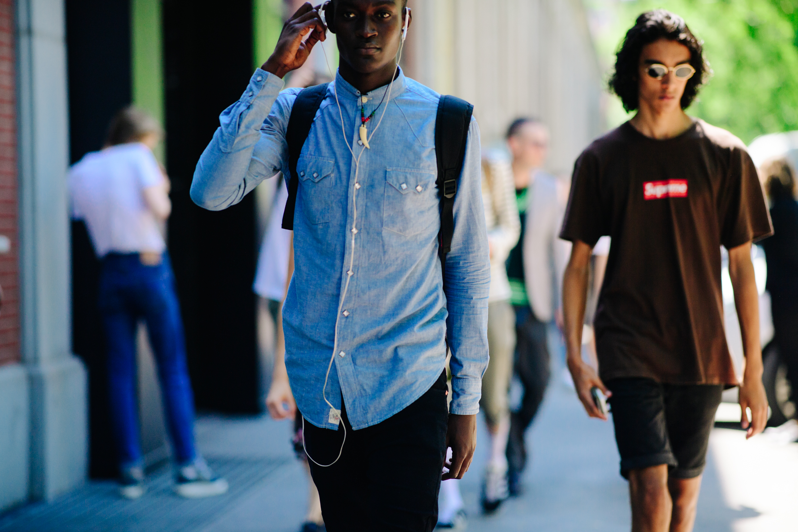 Male model wearing denim shirt