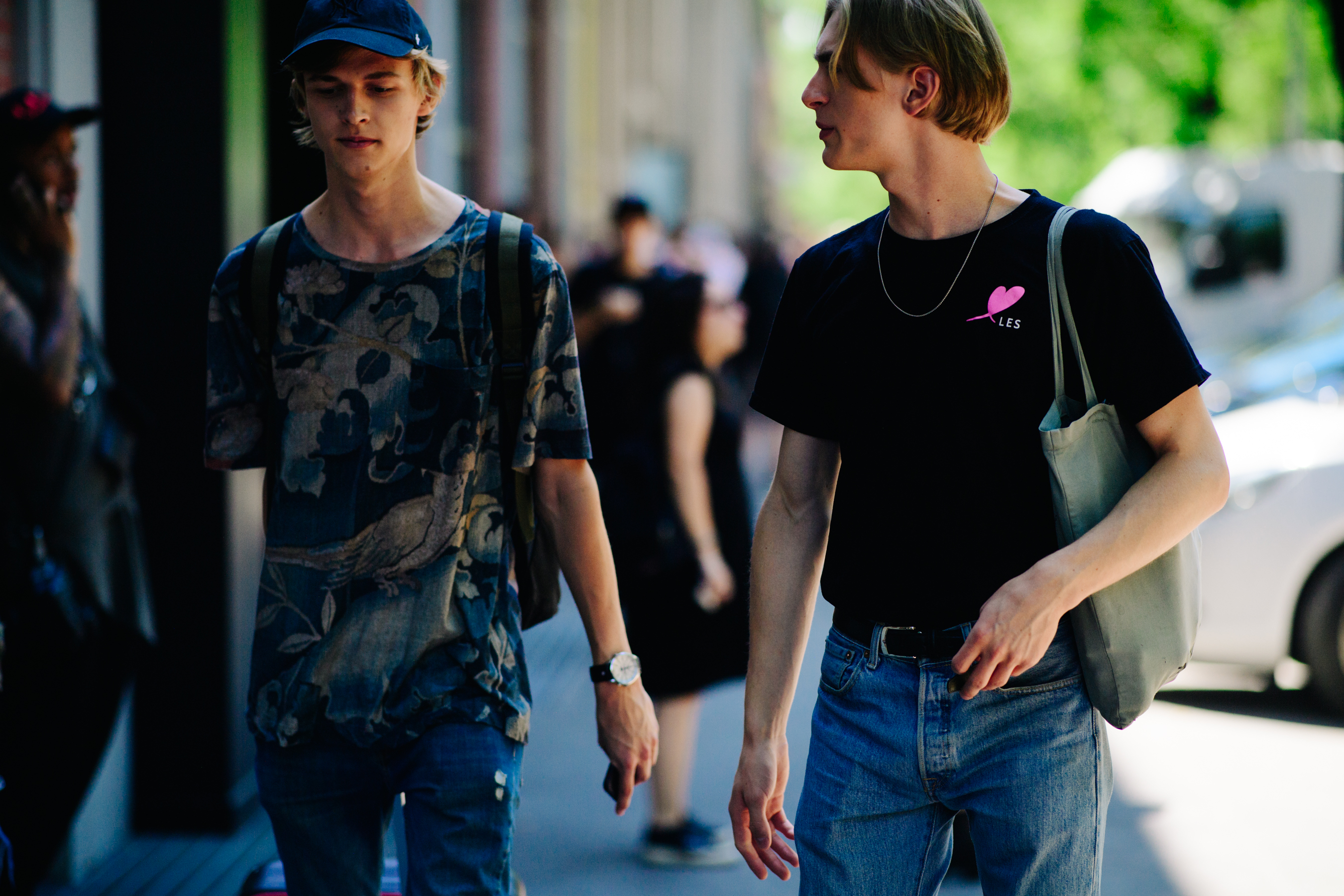 Two male models after a show