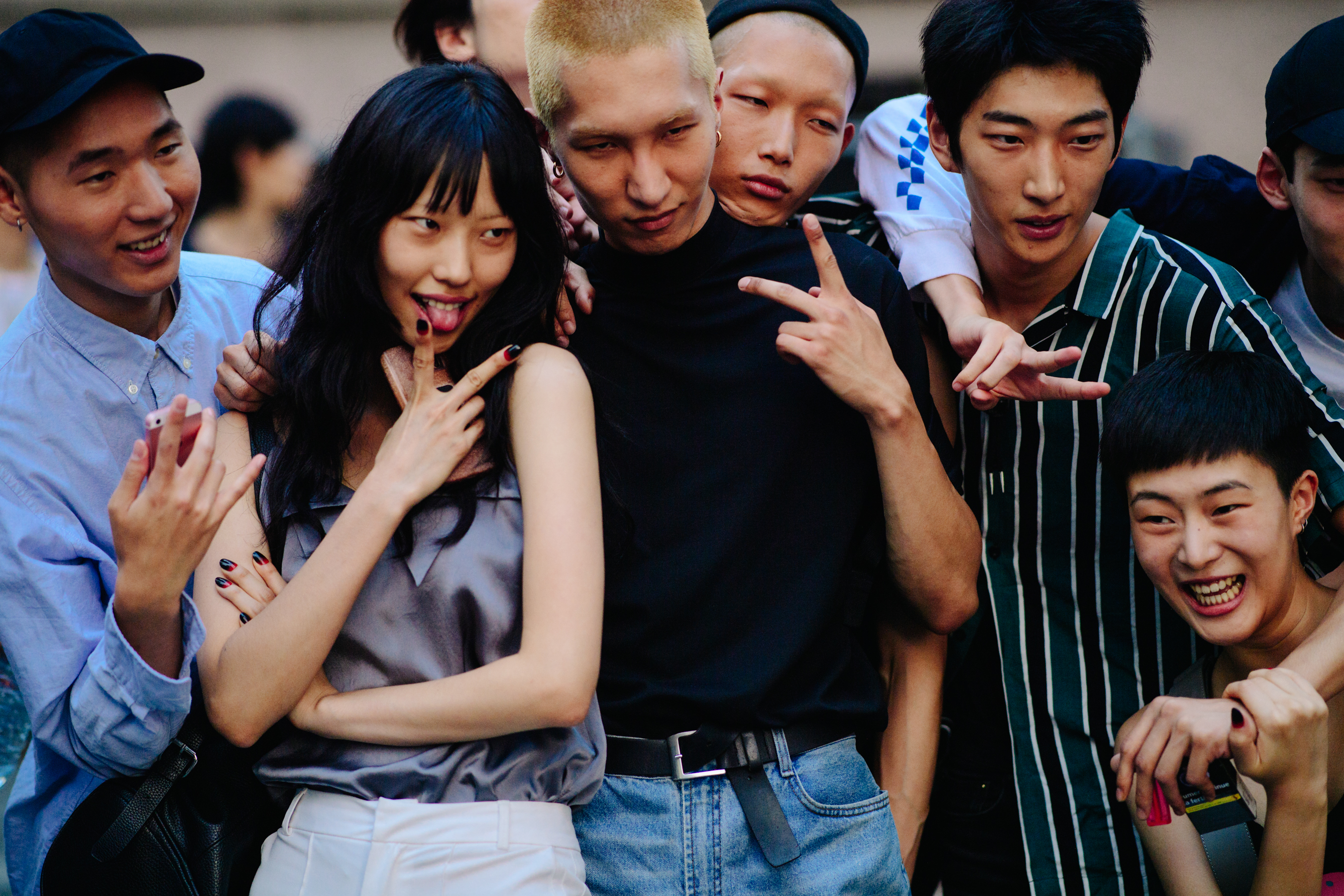 Asian models posing after KENZO show