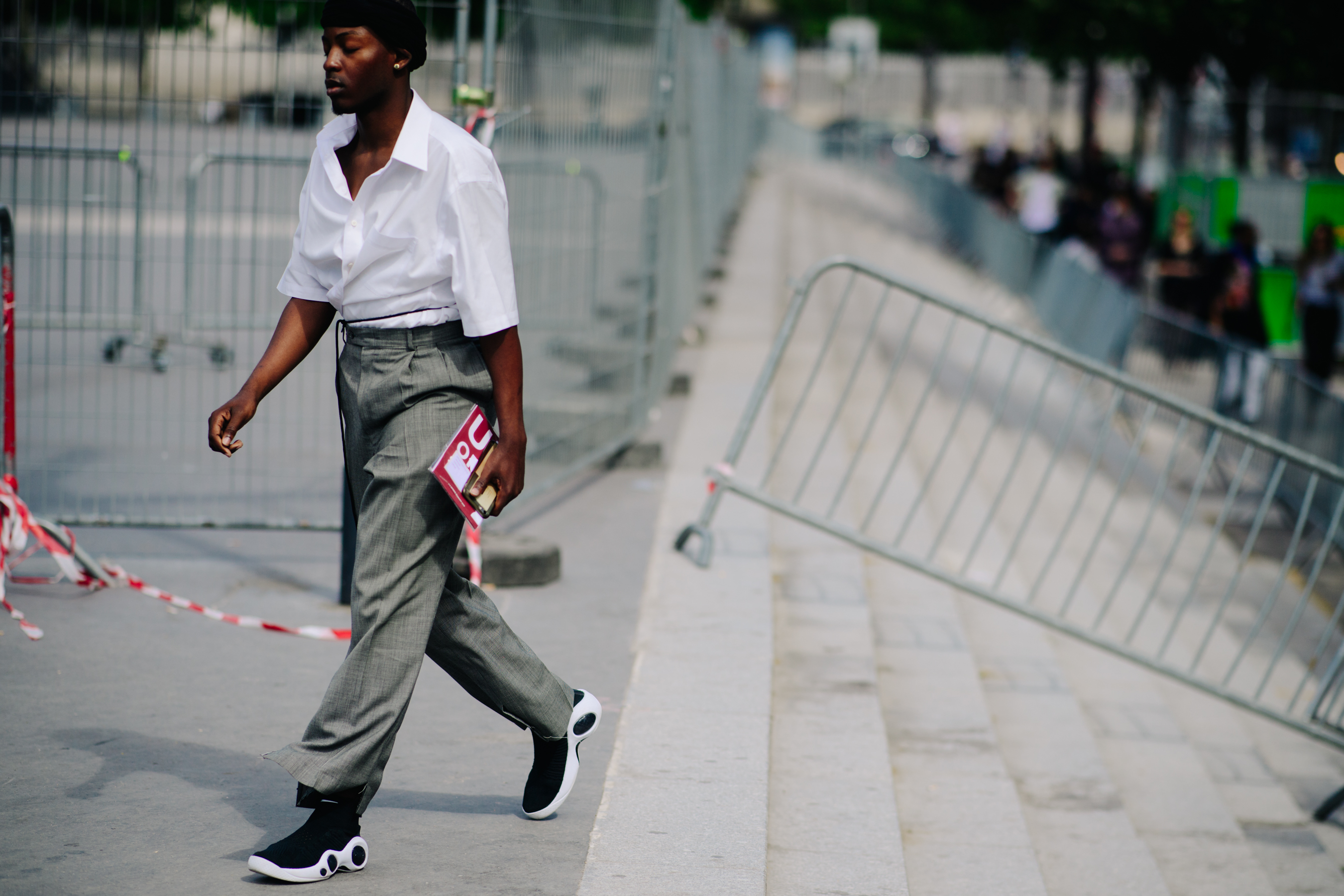 Man wearing large grey trousers