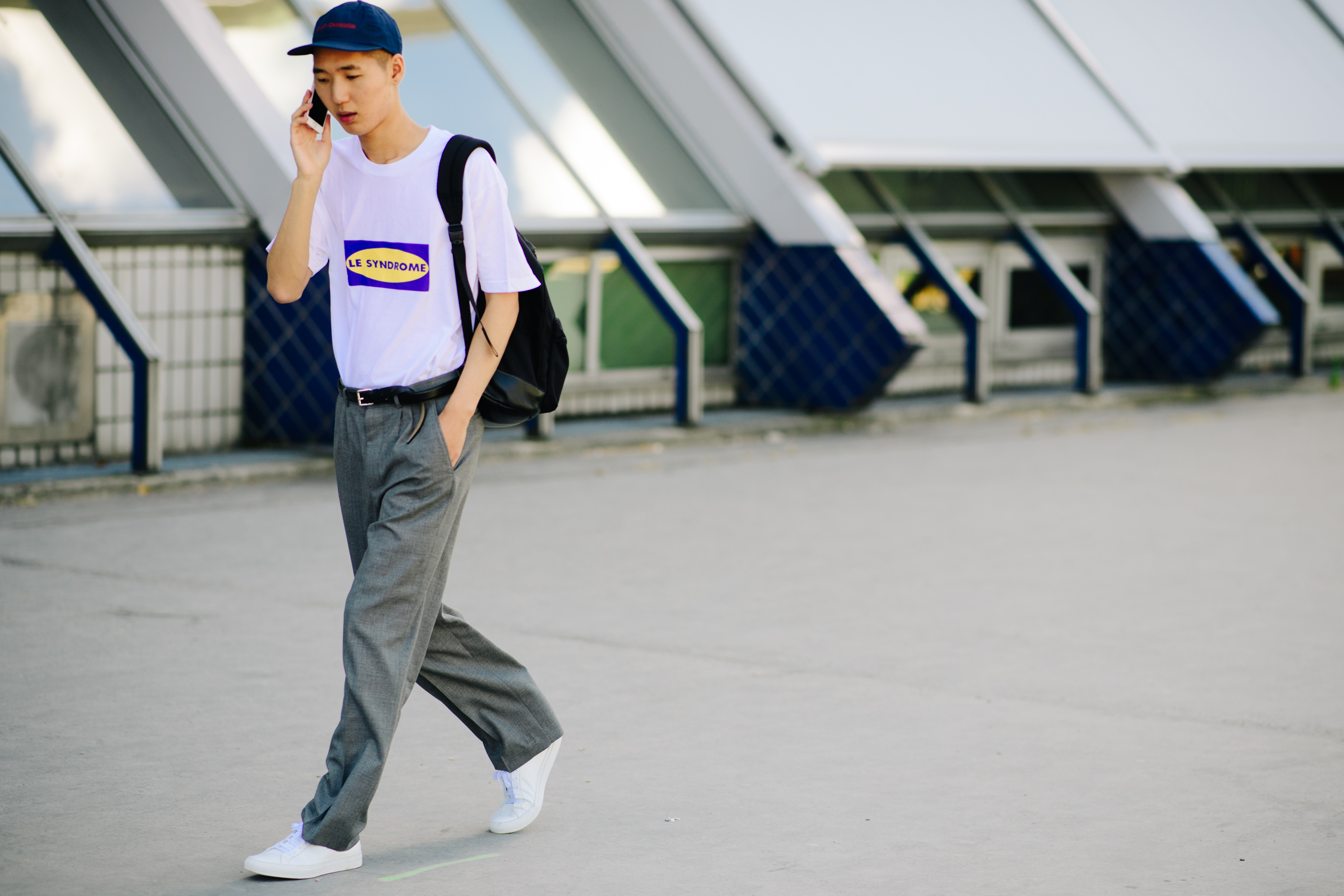 Male model wearing grey chinos