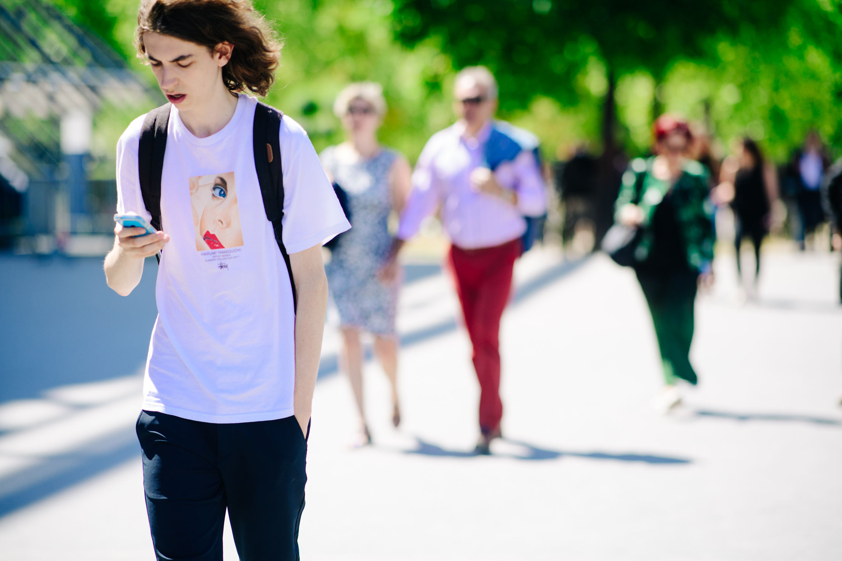 Male model wearing a Stussy t-shirt