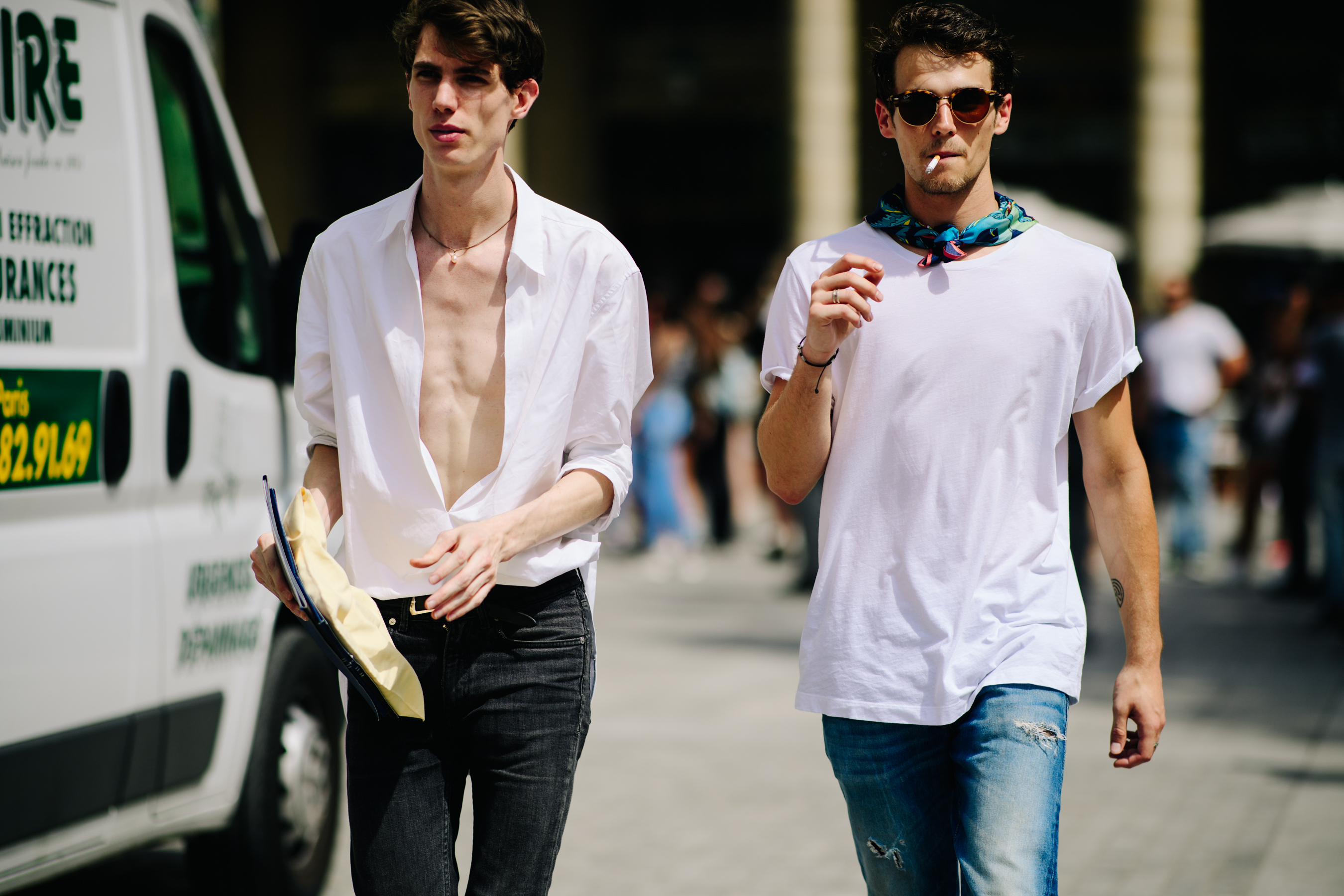 Two models walking after a show