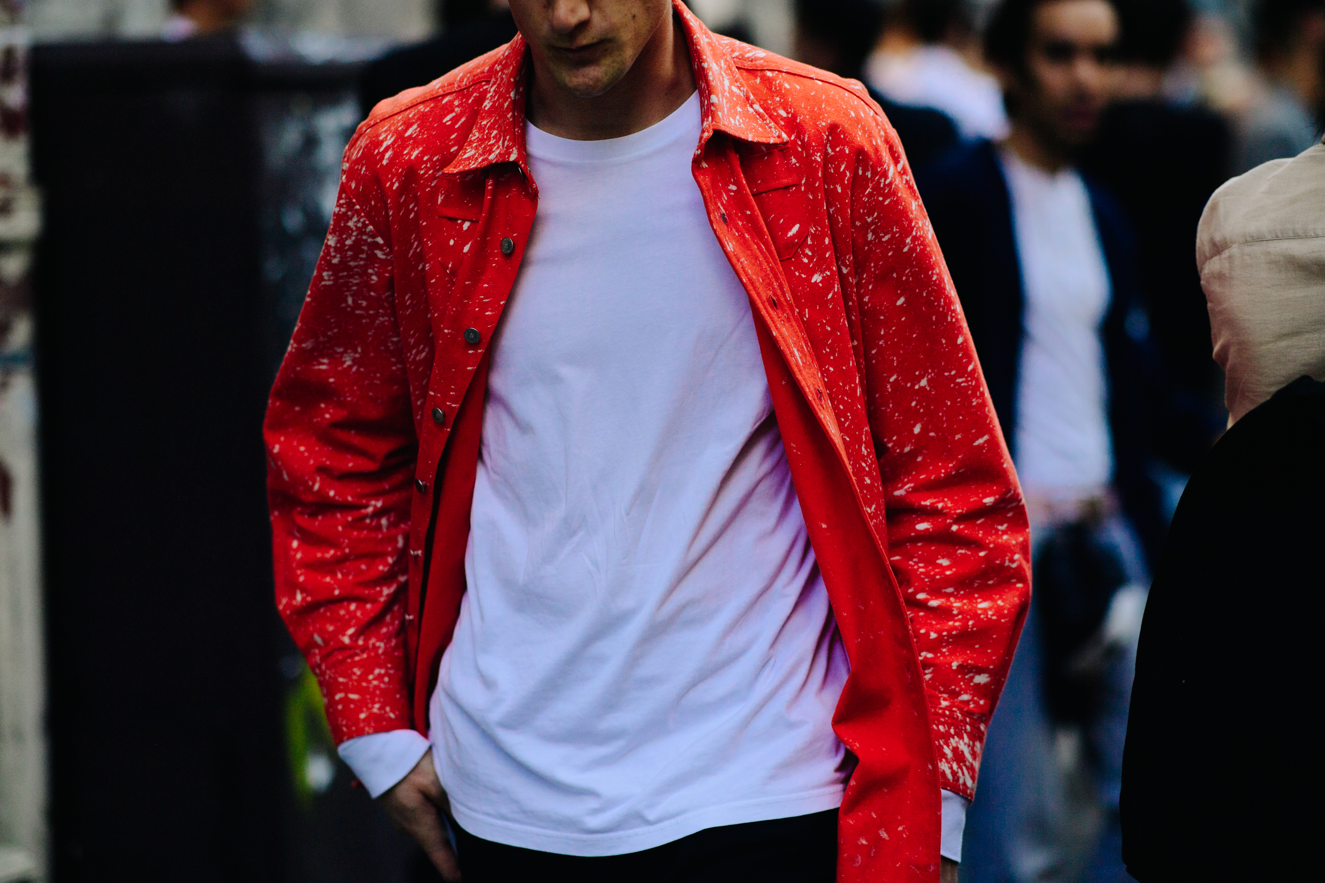 Man wearing a long red jacket