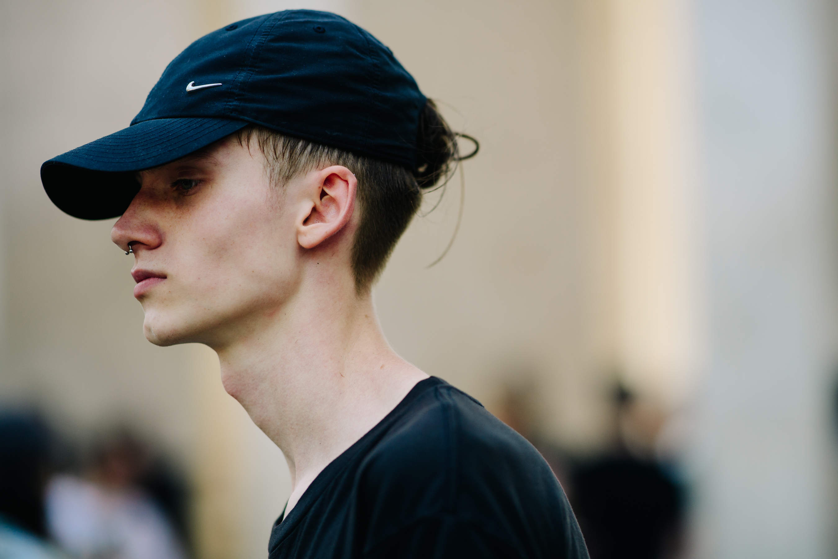 Male model wearing a Nike cap