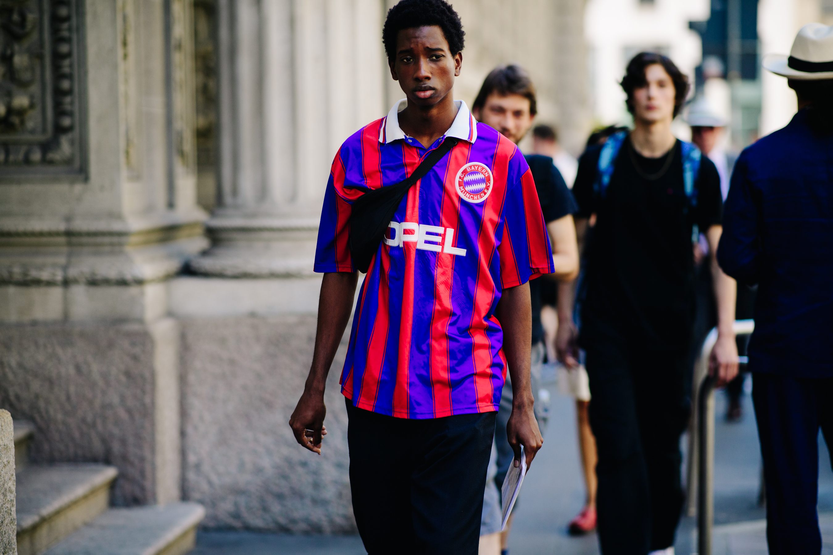 Male model wearing a football t-shirt