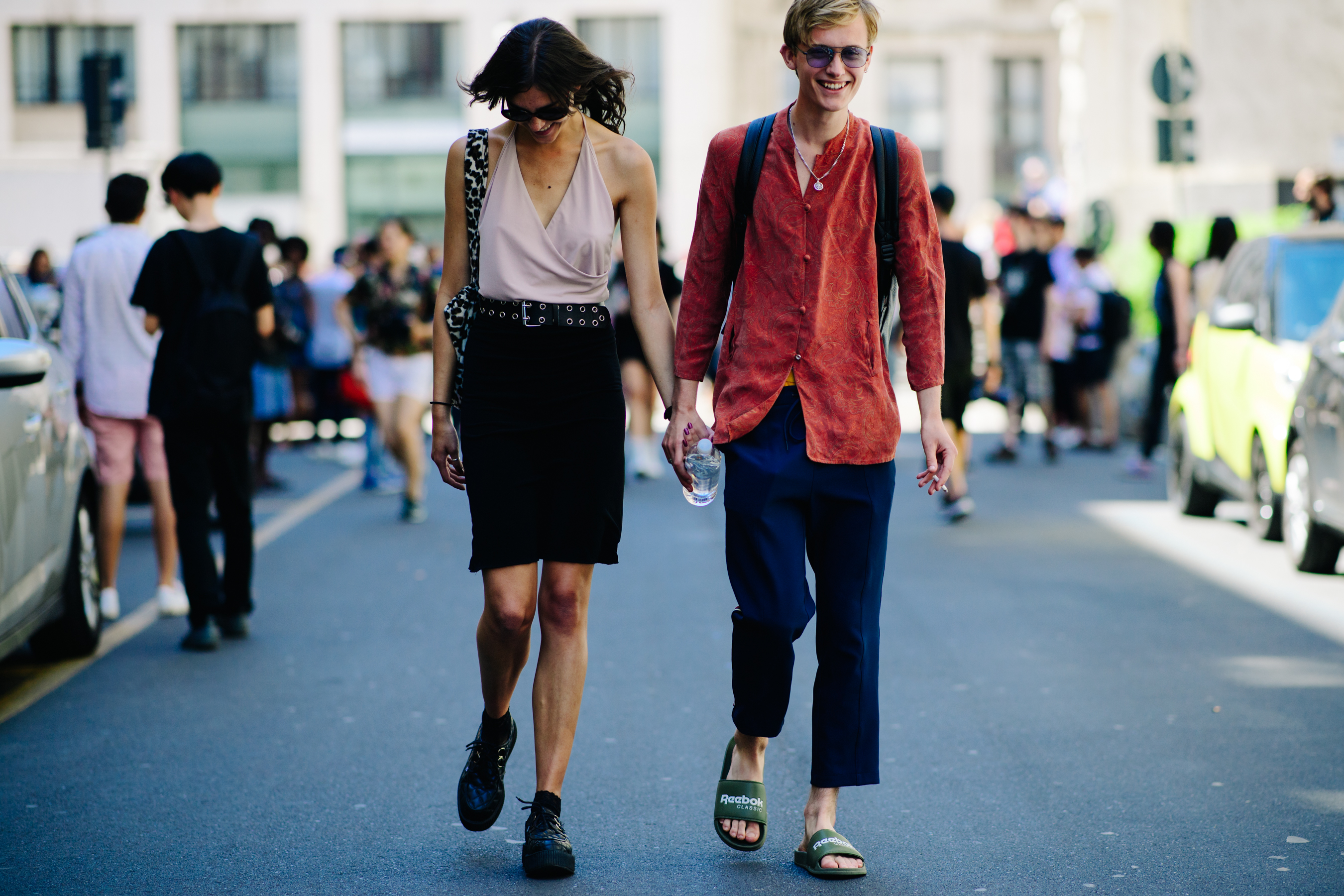 Male model wearing Reebok flip flops