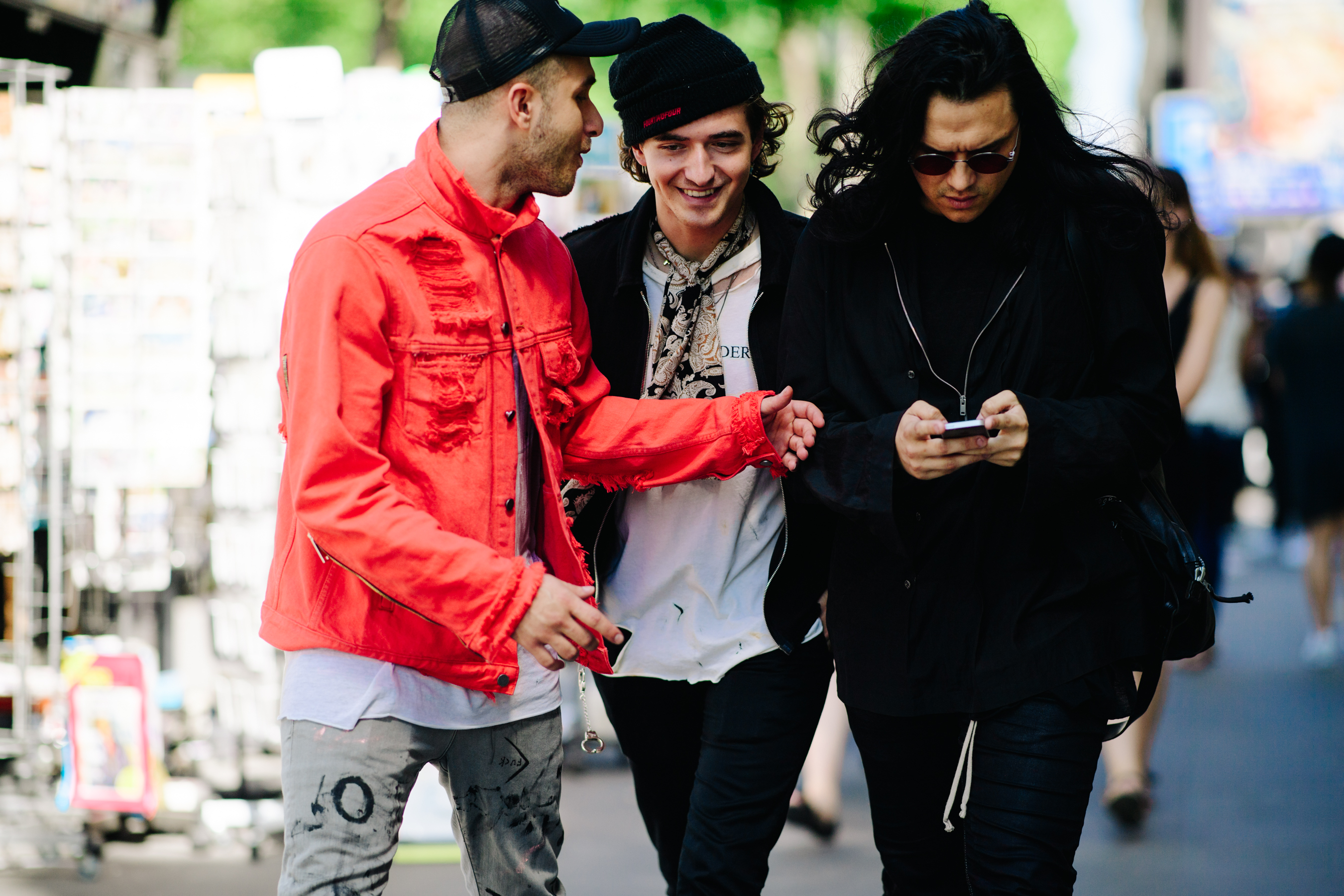 Three man discussing on the street