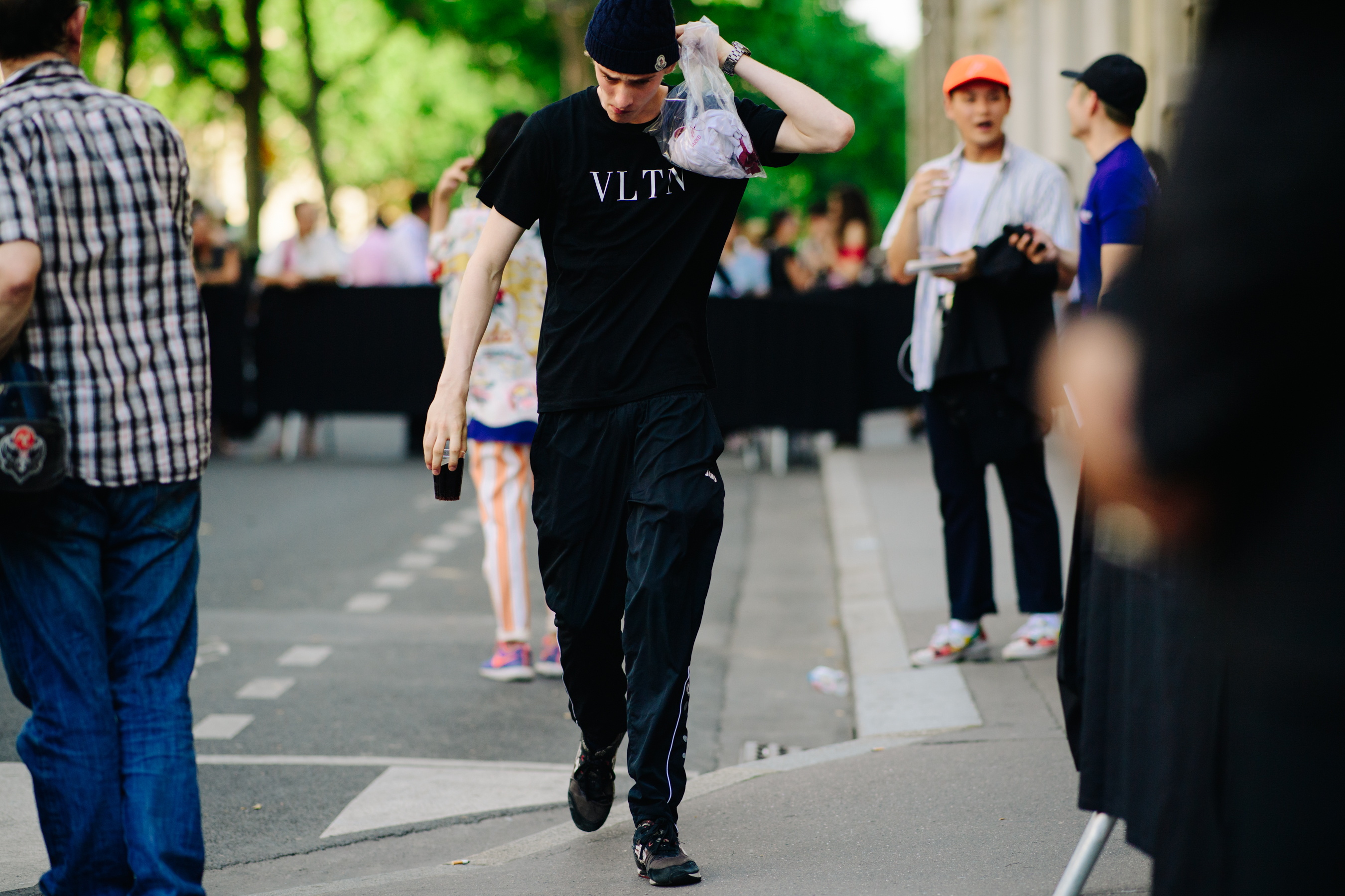 Male model wearing Valentino and Moncler