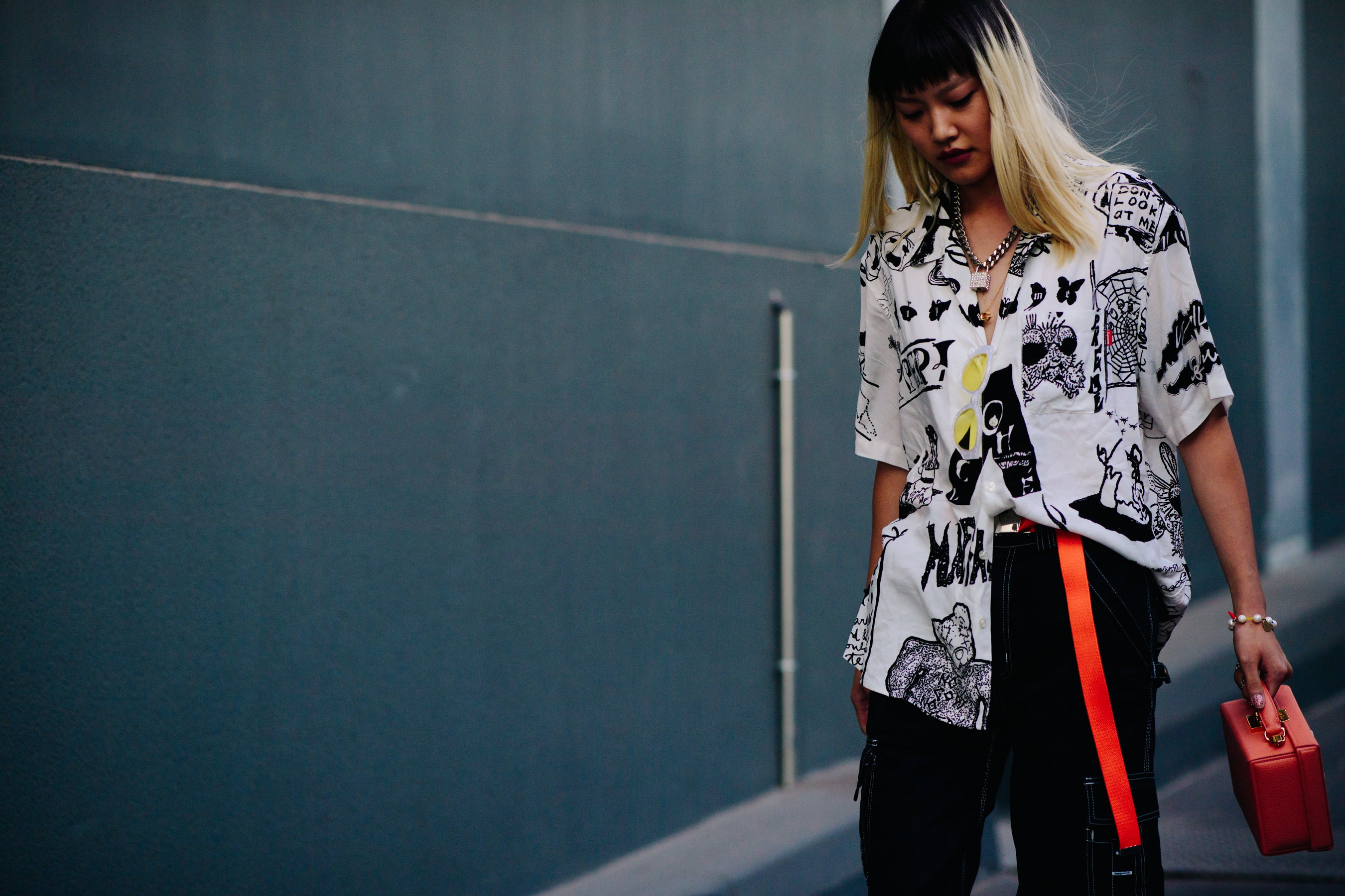 Woman wearing a white printed shirt