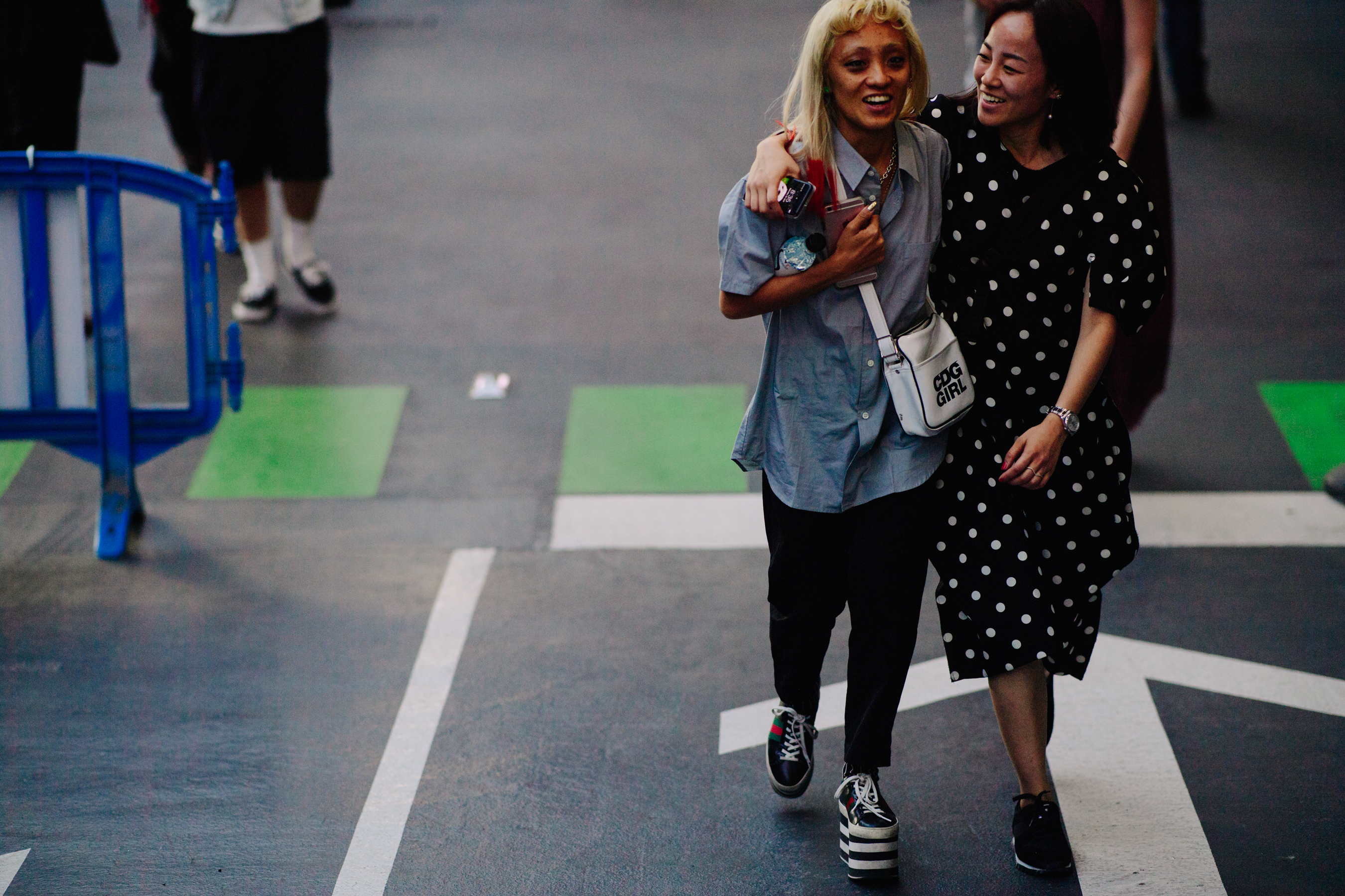 Woman wearing Comme des Garçons and Gucci