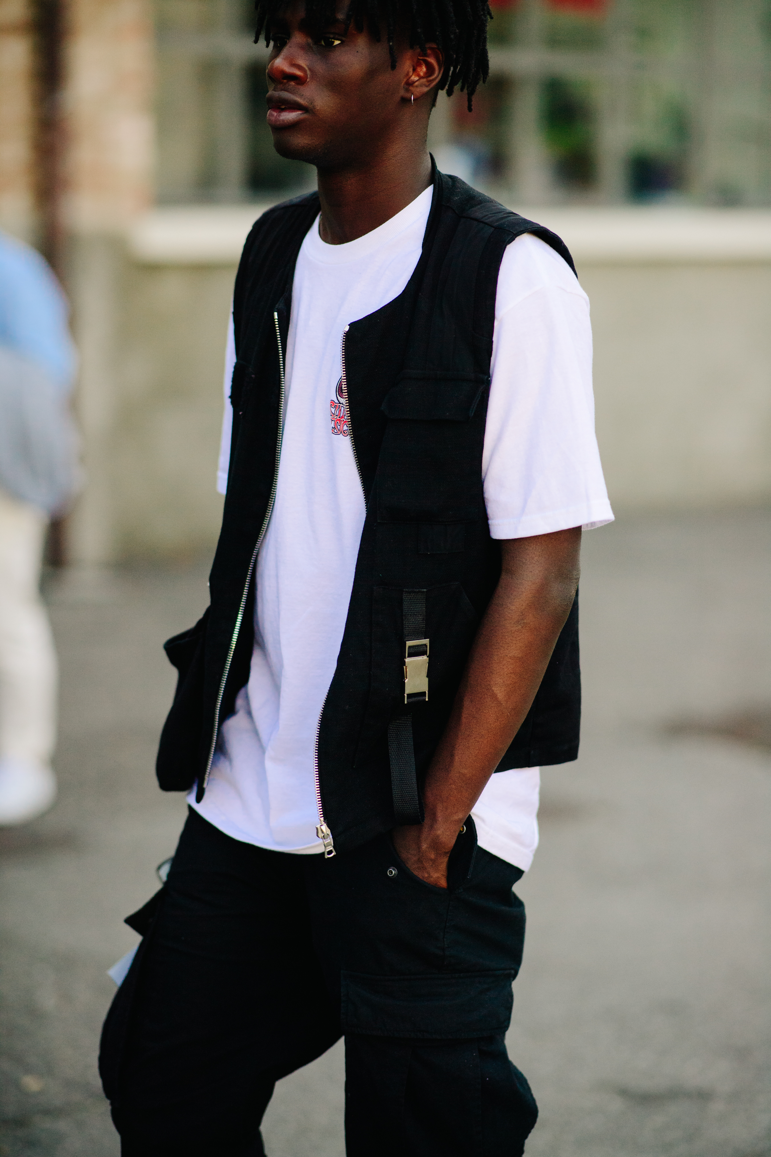 Man wearing black vest