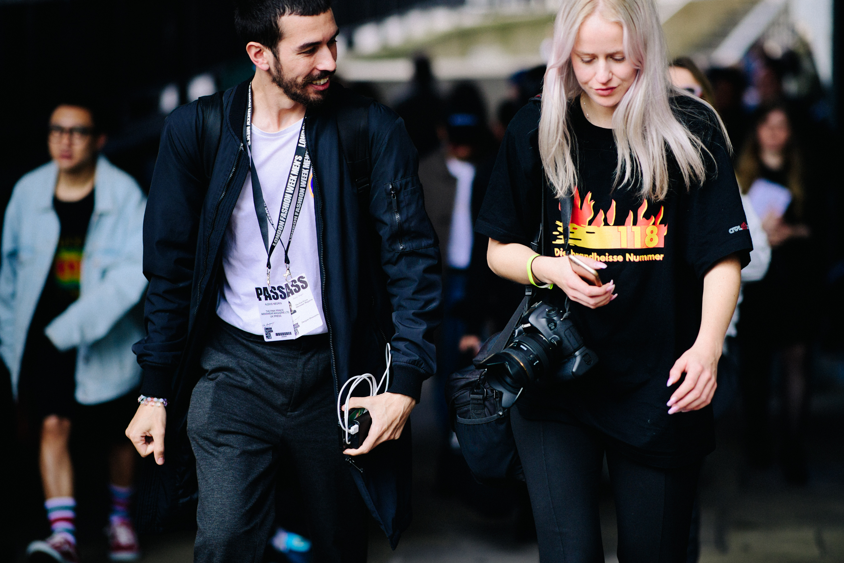 Man wearing bomber and suit pants