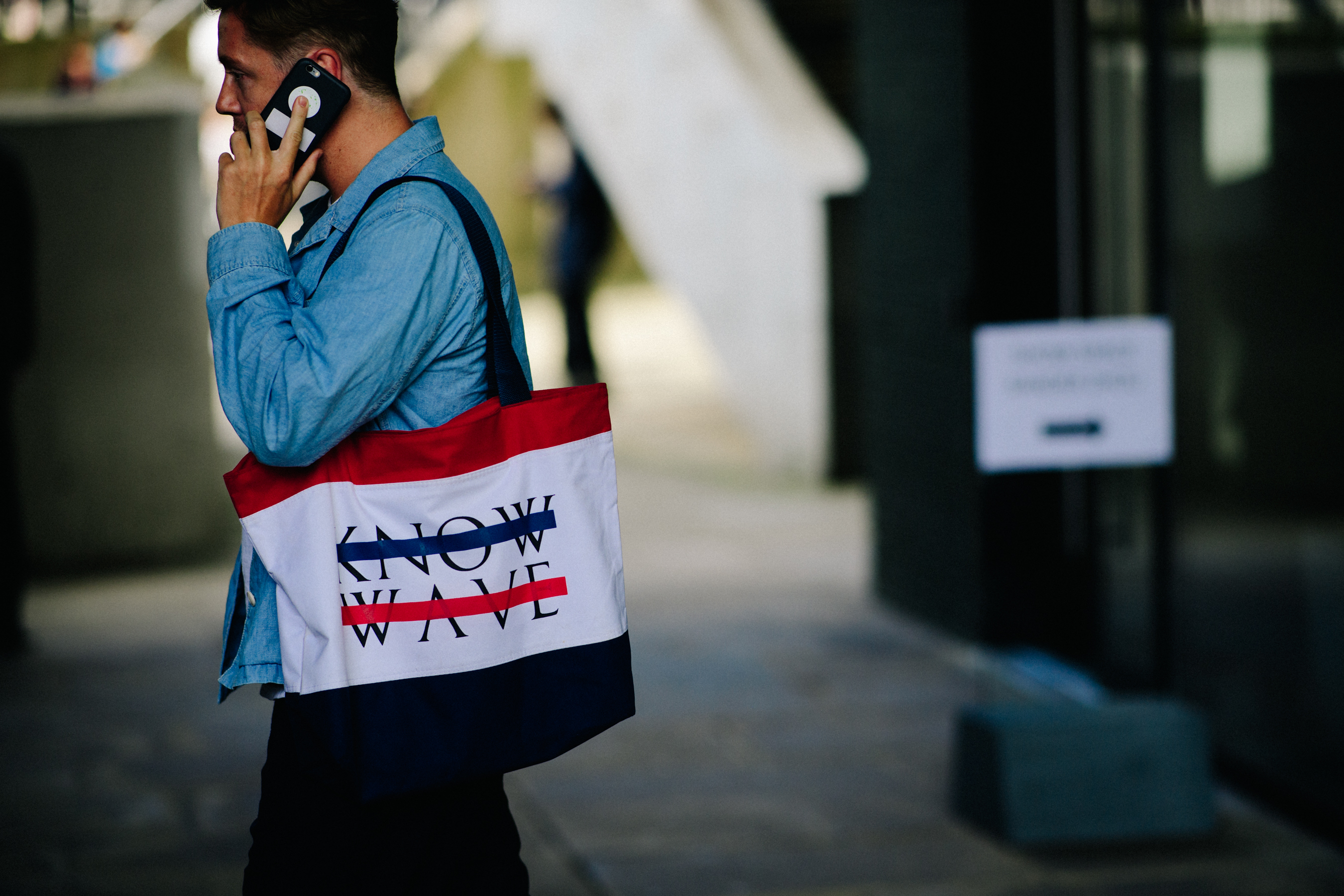 Man wearing Know Wave bag