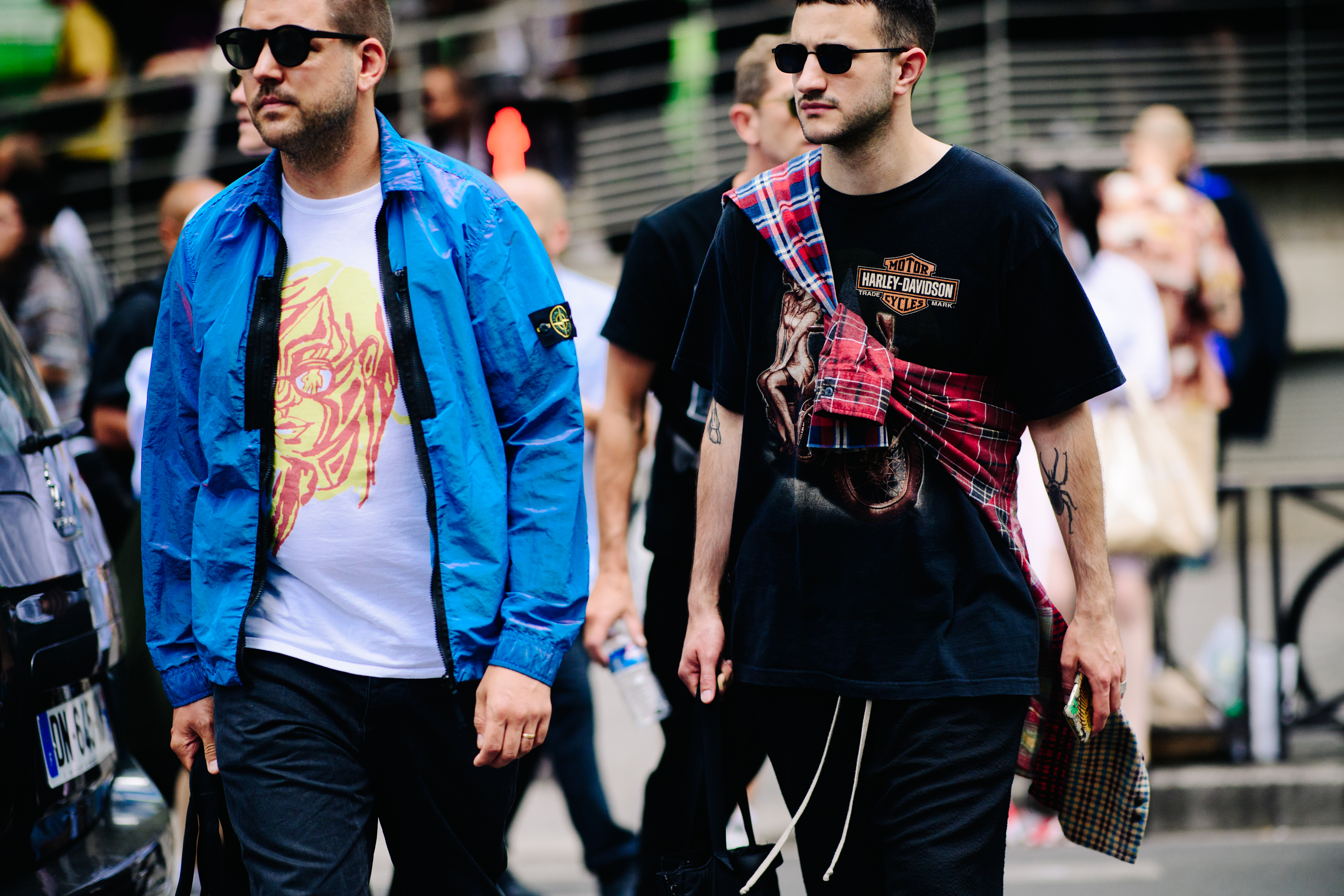 Man wearing blue Stone Island vest