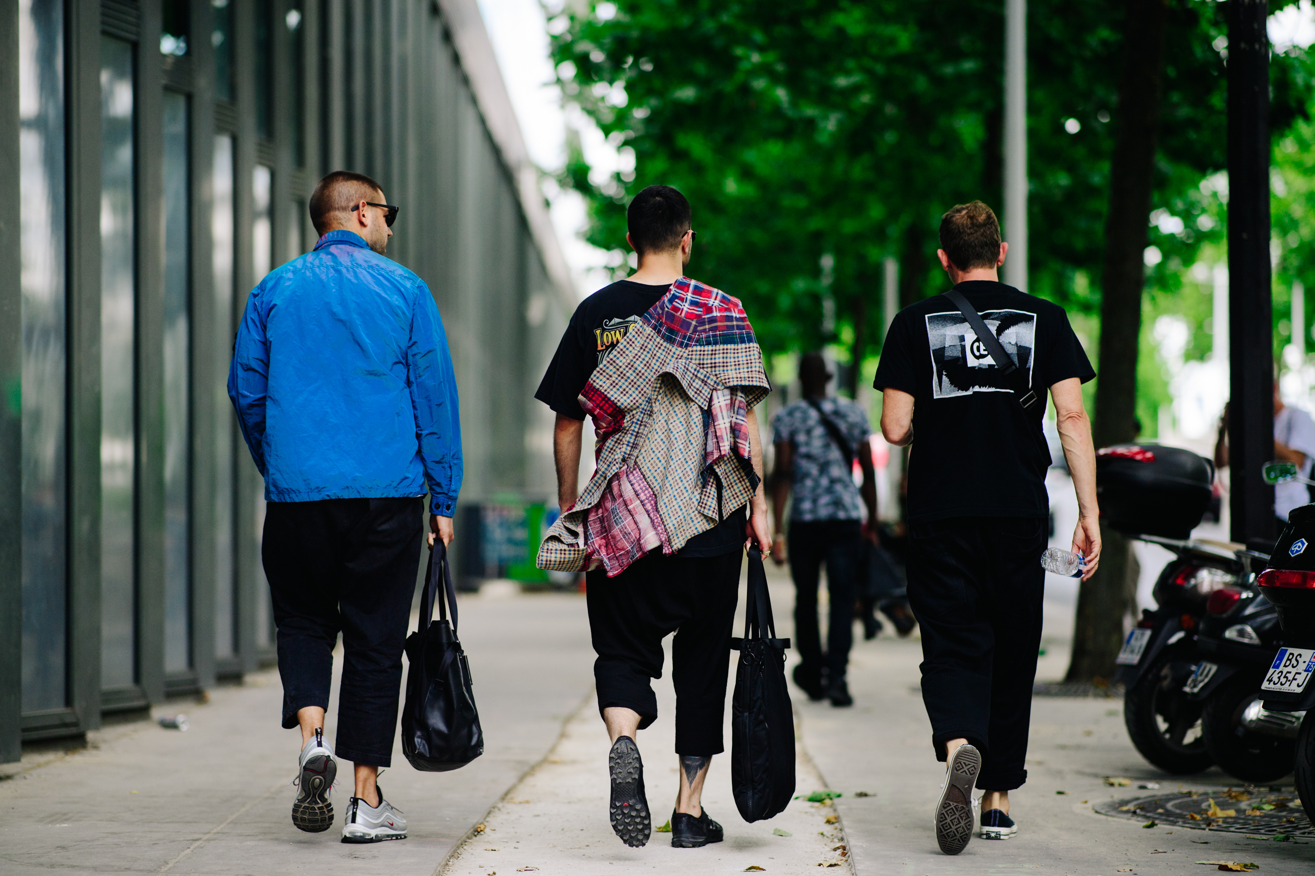Men wearing Nike and Converse shoes