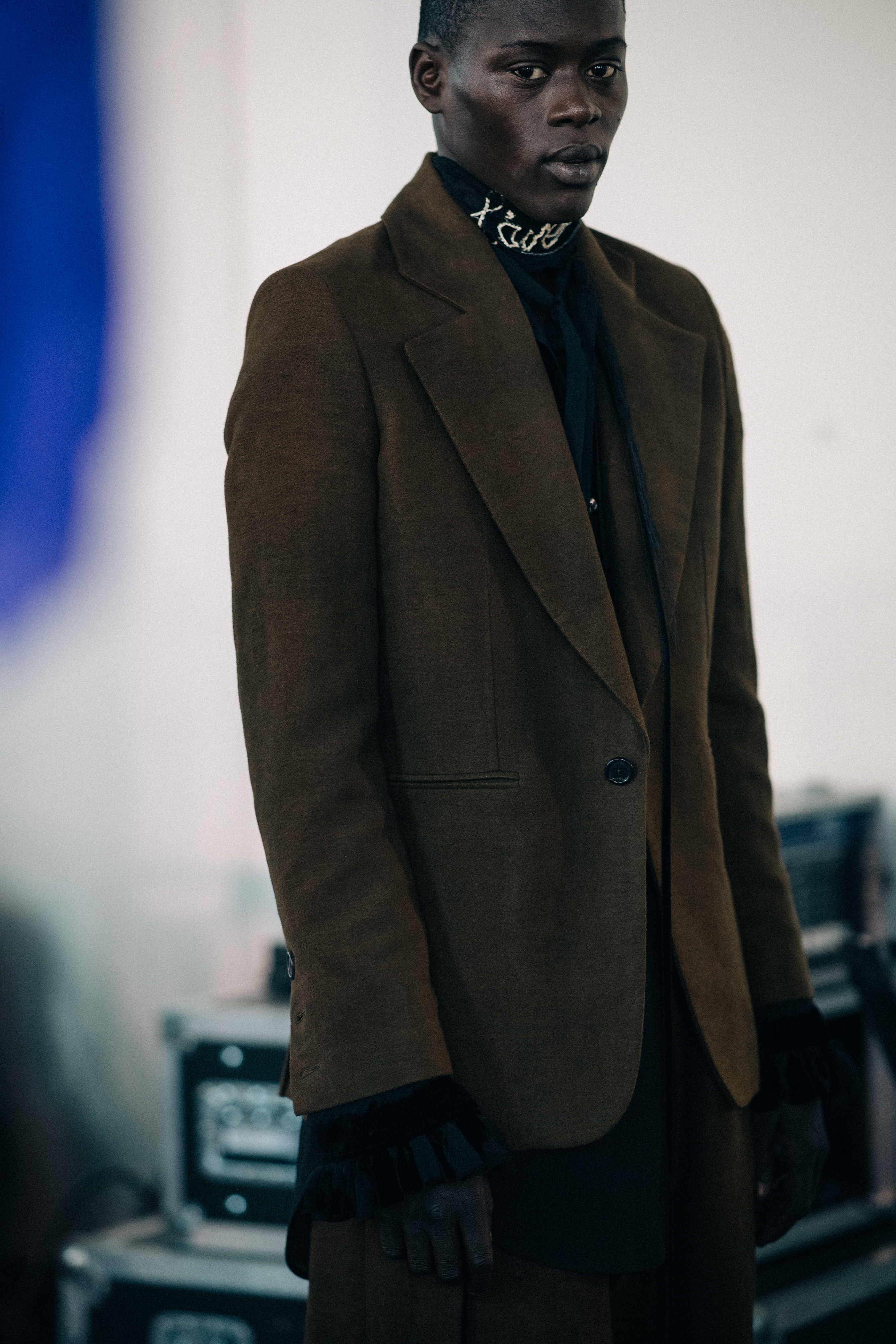 Male model Alpha Dia wearing blazer