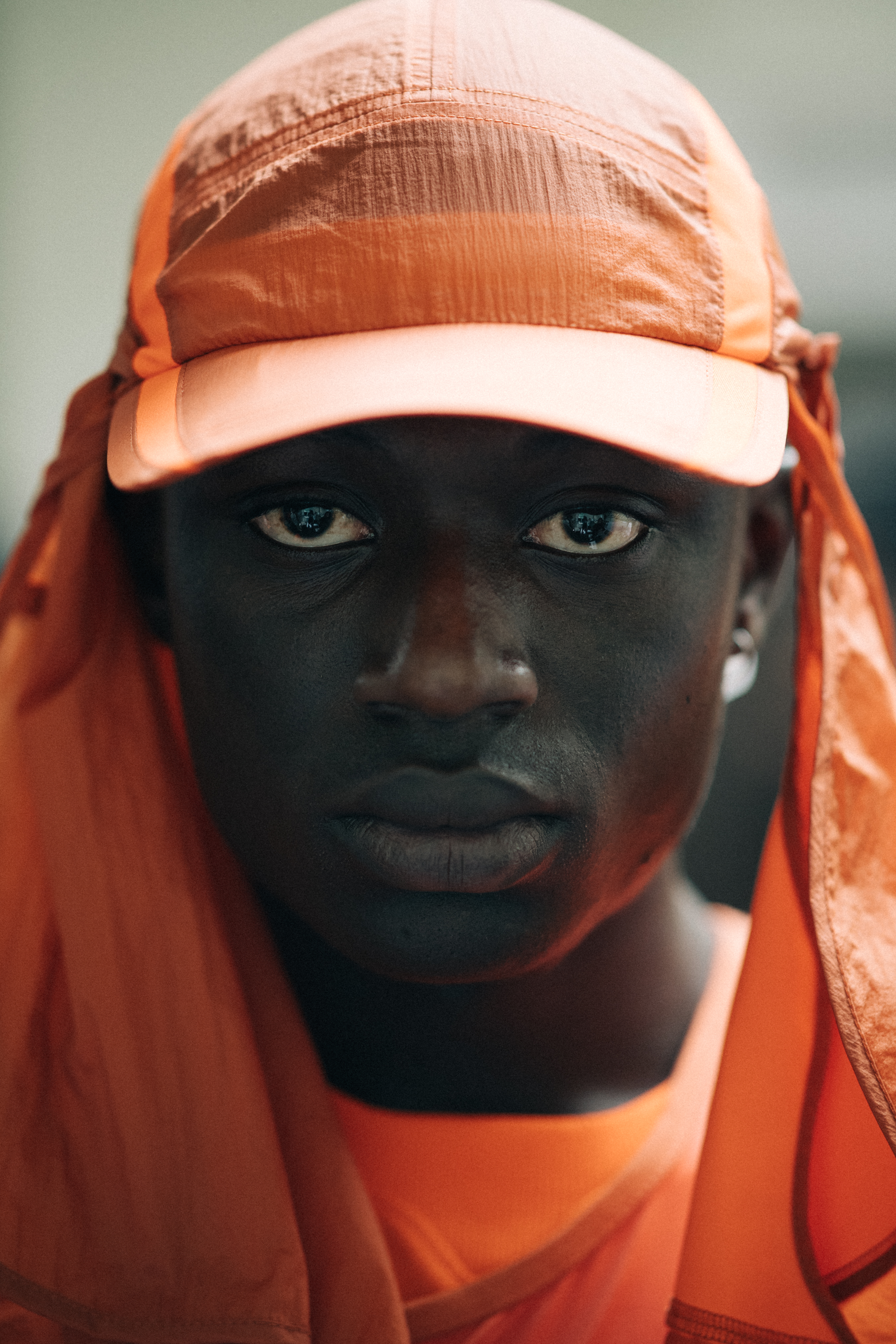 Portrait of Abdourahman Nije wearing a cap