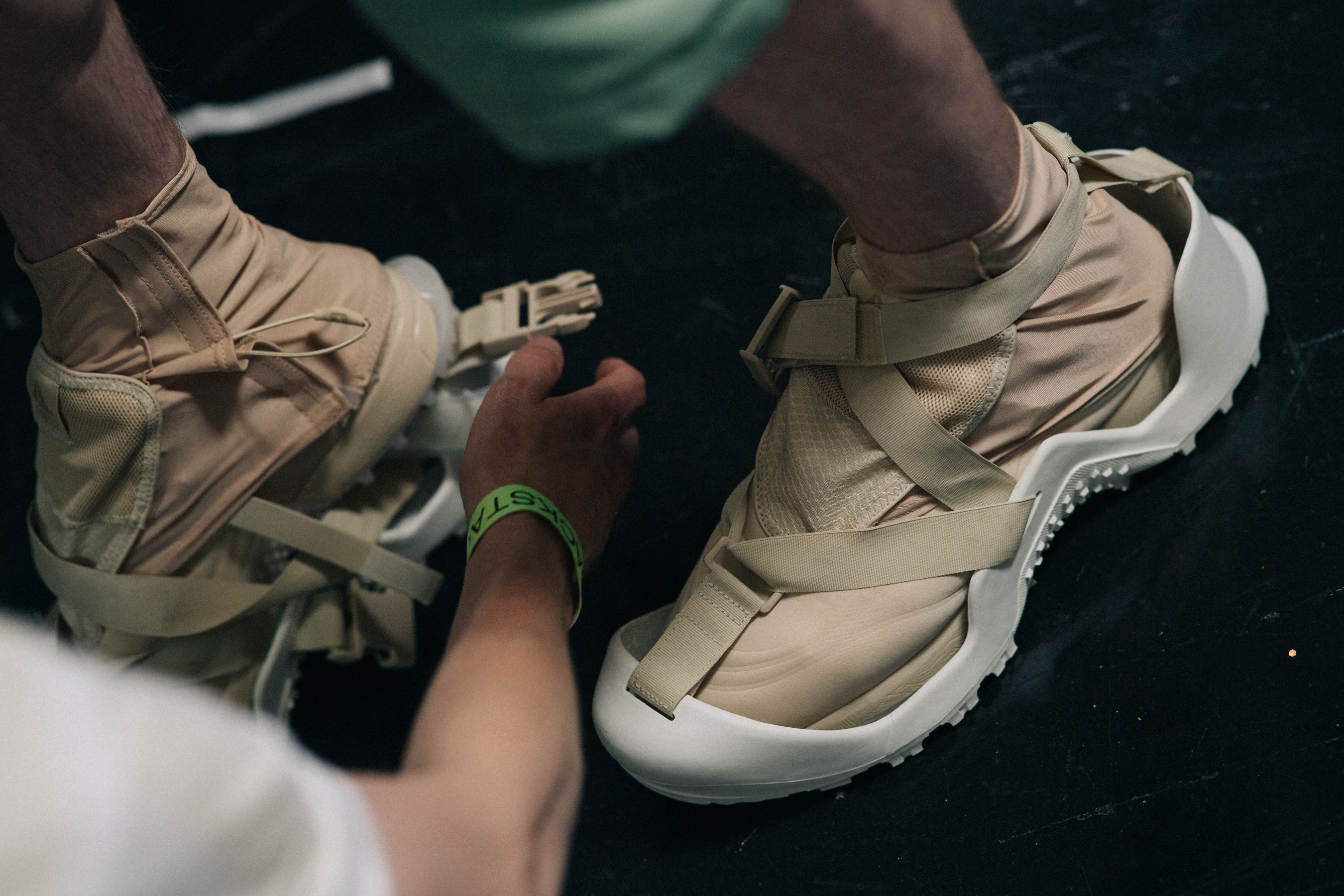 Detail of beige deconstructed sneakers