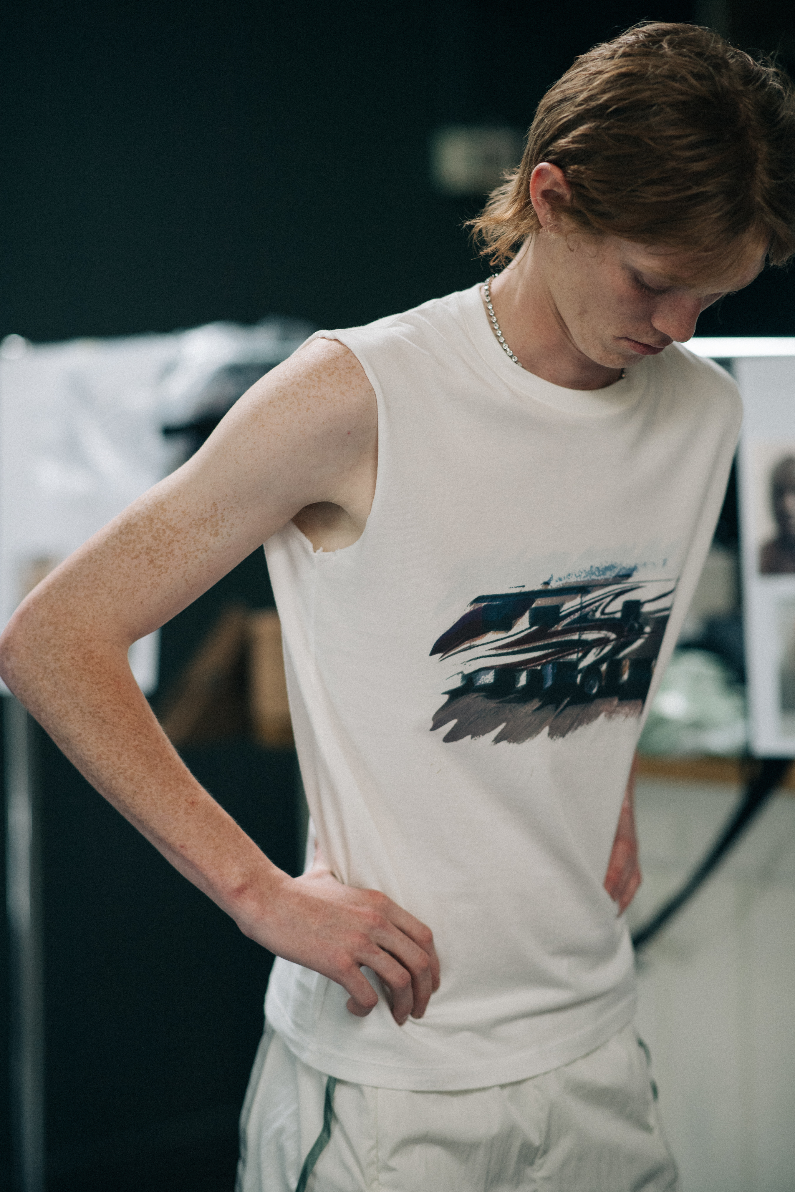 Model wearing a sleeveless t-shirt