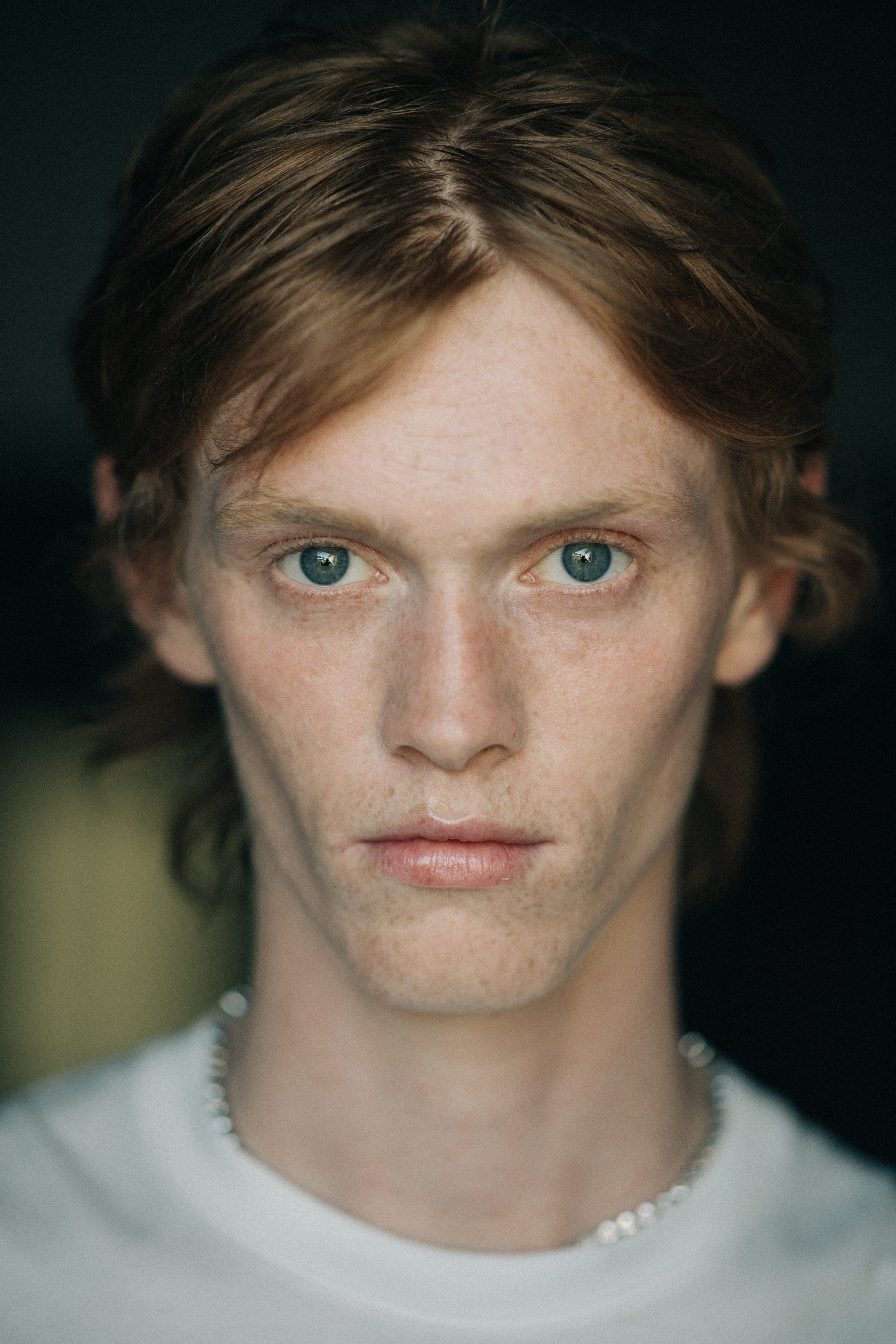Portrait of a male model with freckles