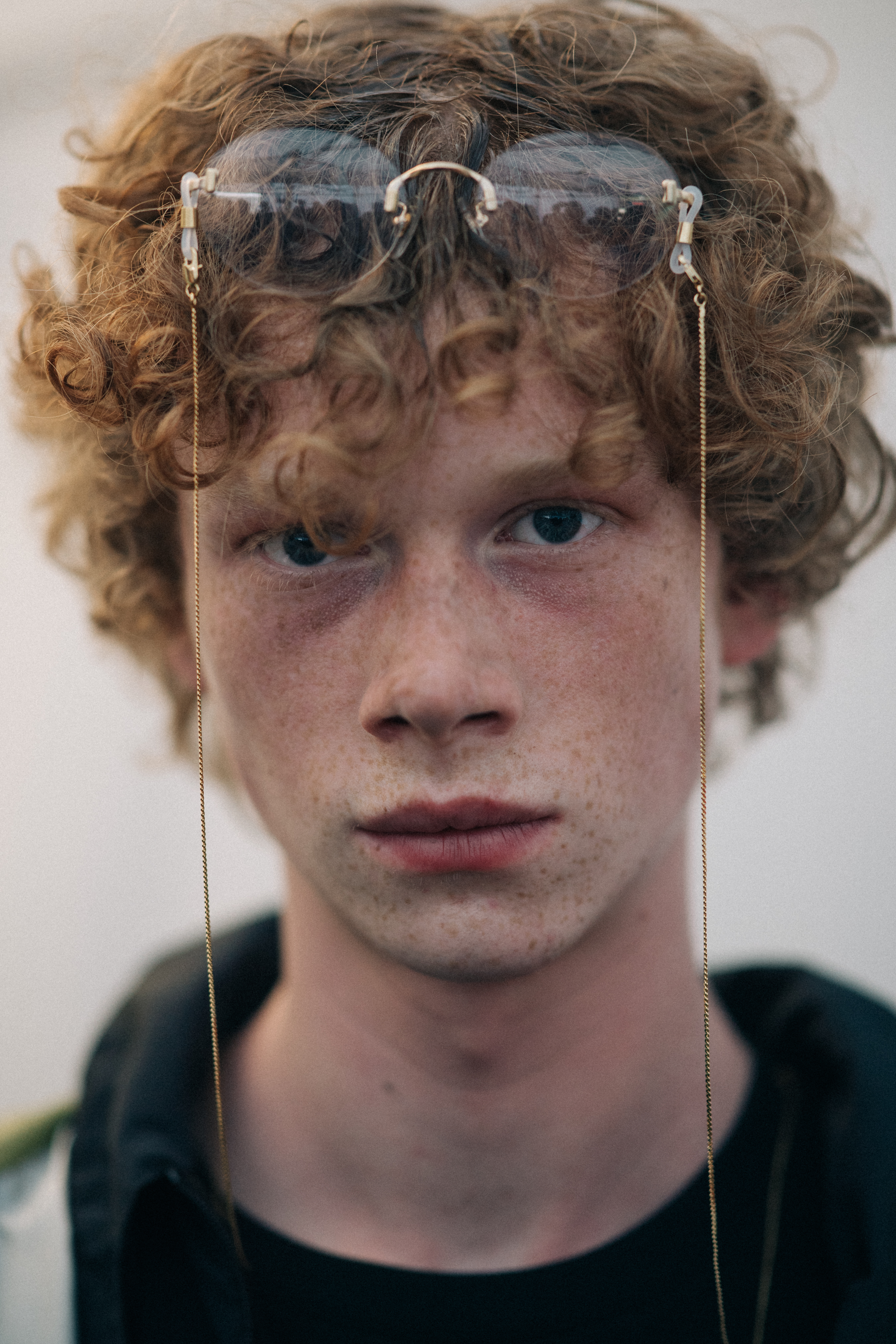 Portrait of a young model with freckles