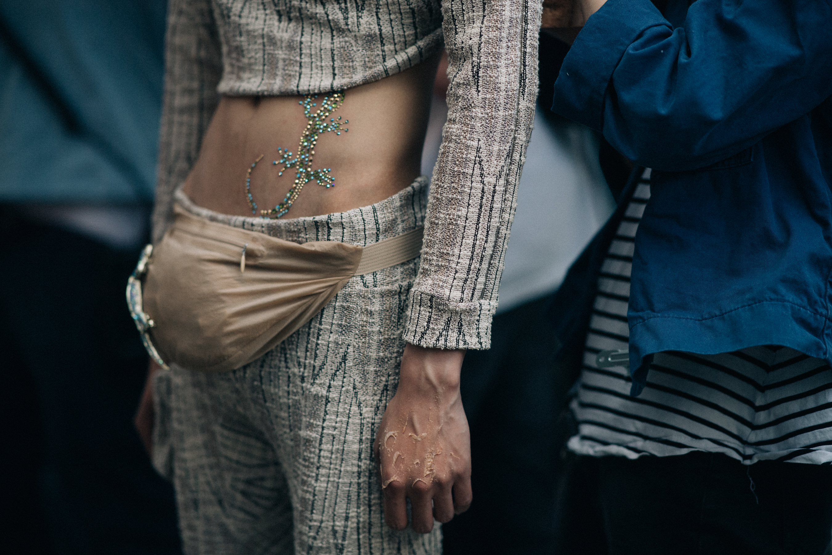 Male model wearing a fanny pack
