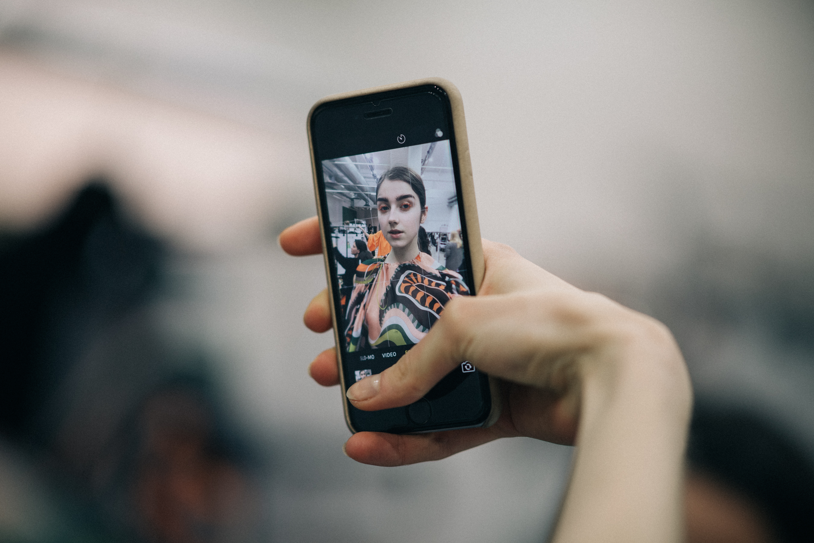 Female model taking a selfie