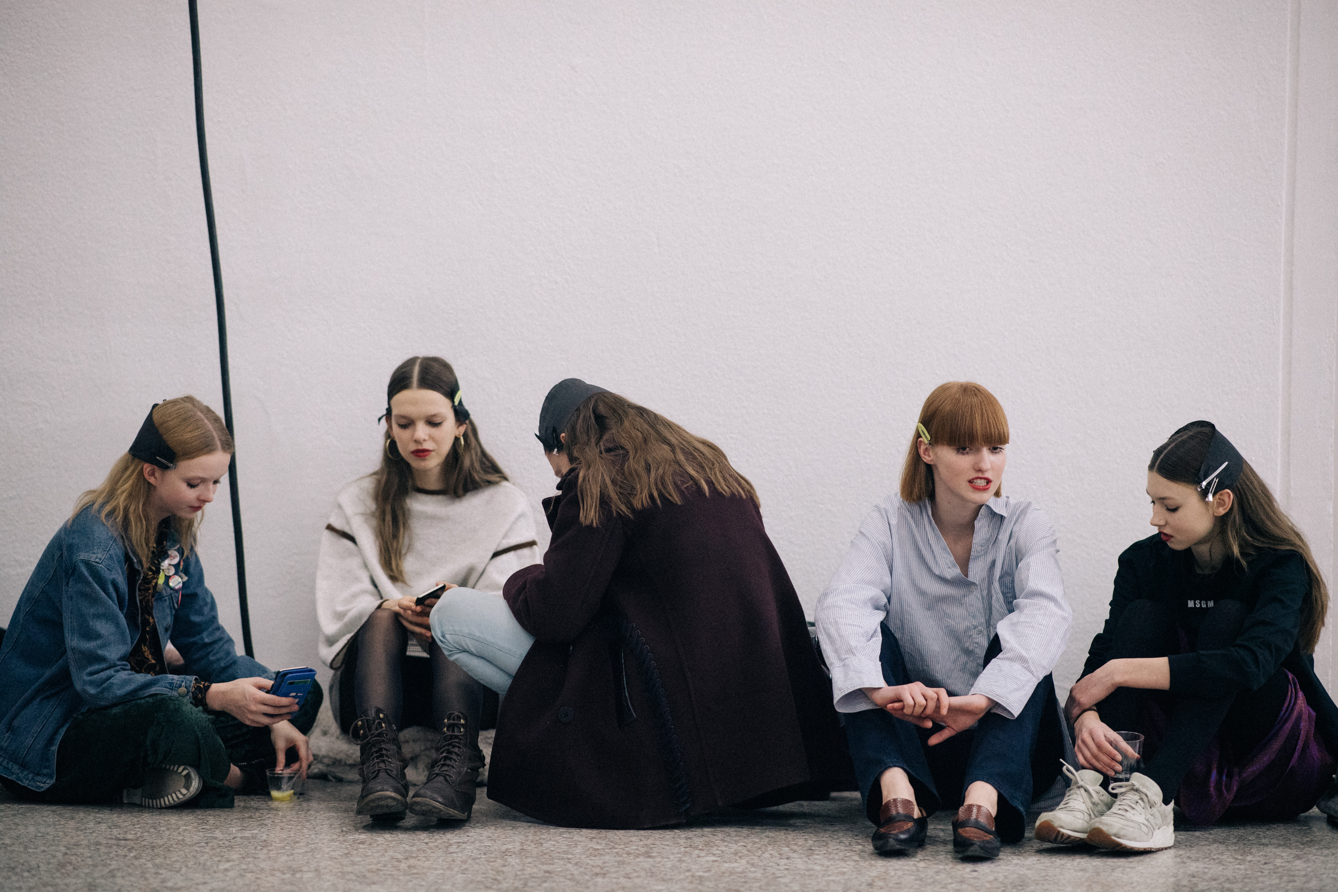 Models hanging out at MSMG in Milan