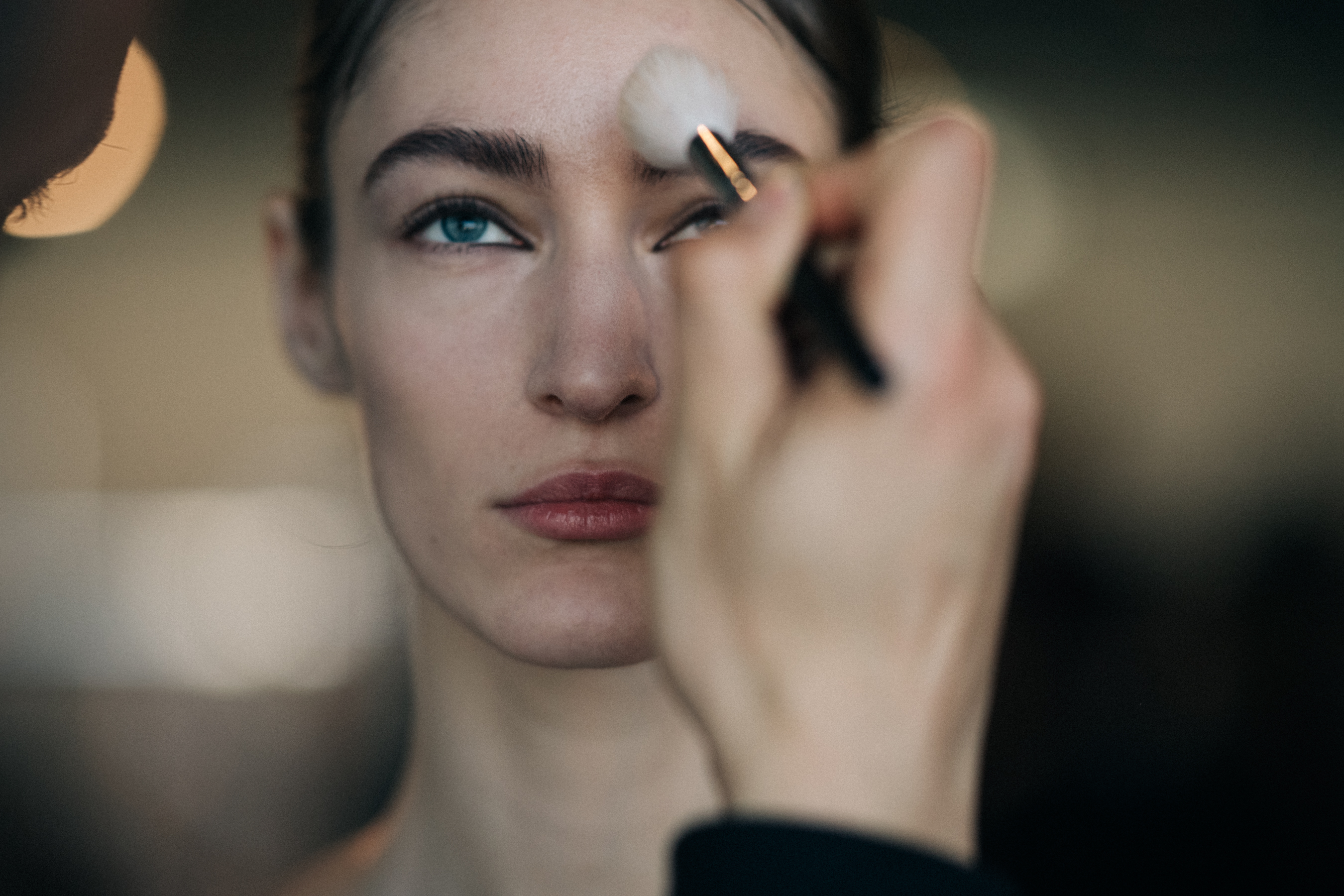 Model getting make up done
