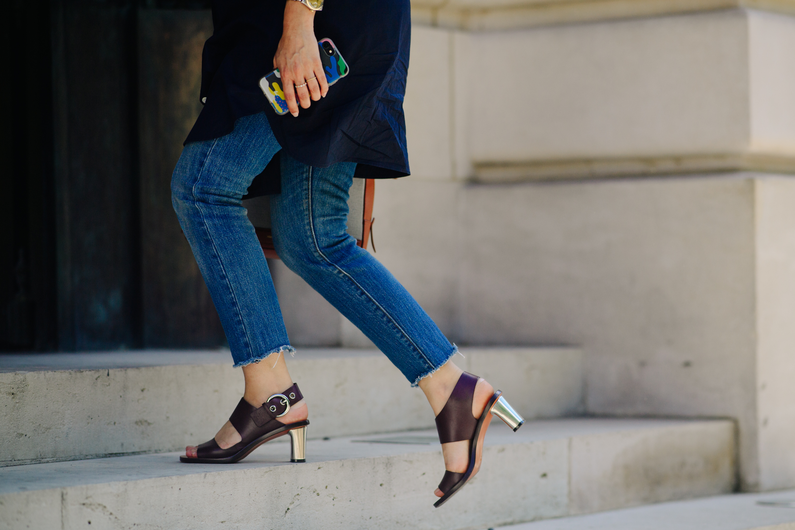 Woman wearing brown leather sandals