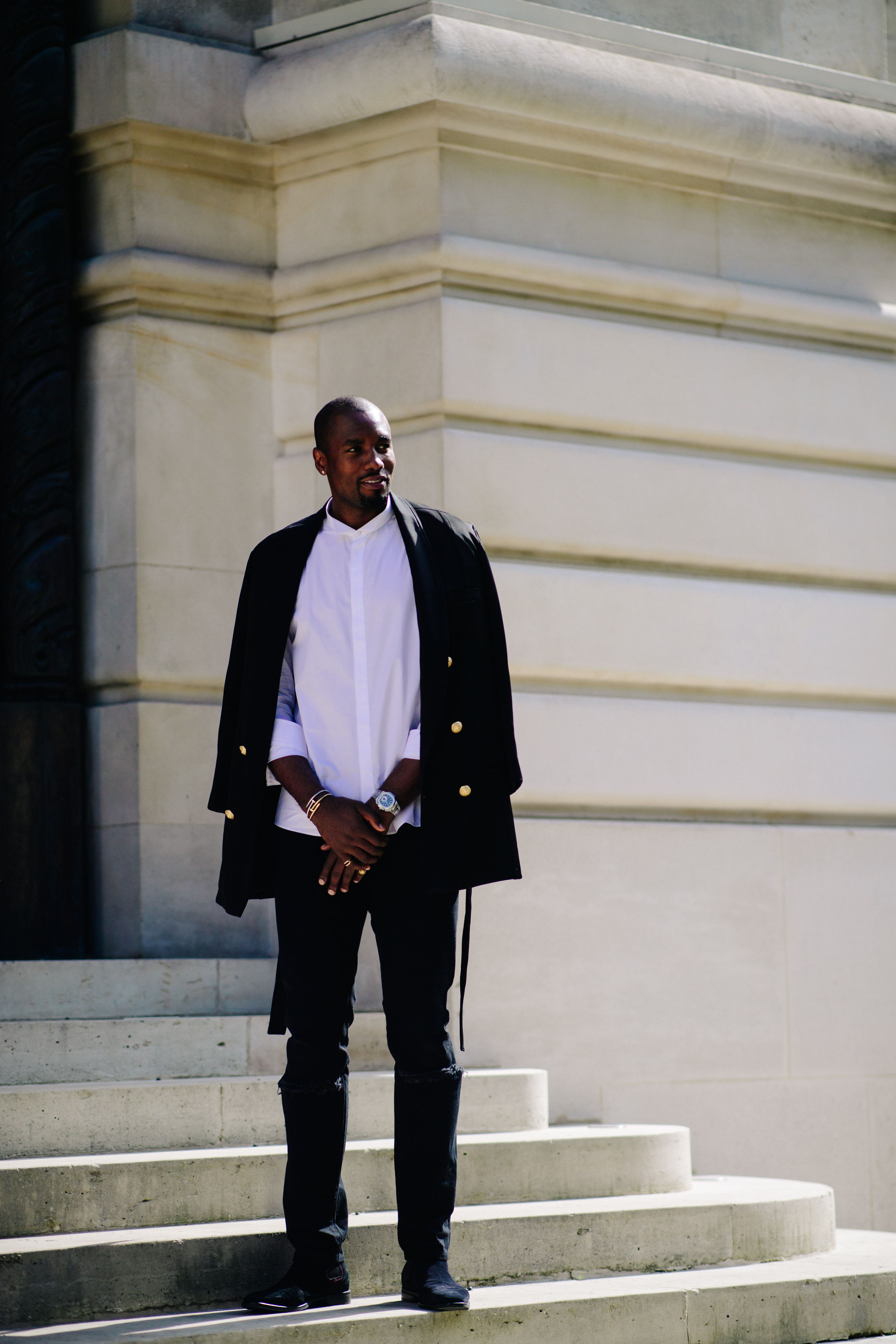 Man posing before Balmain show